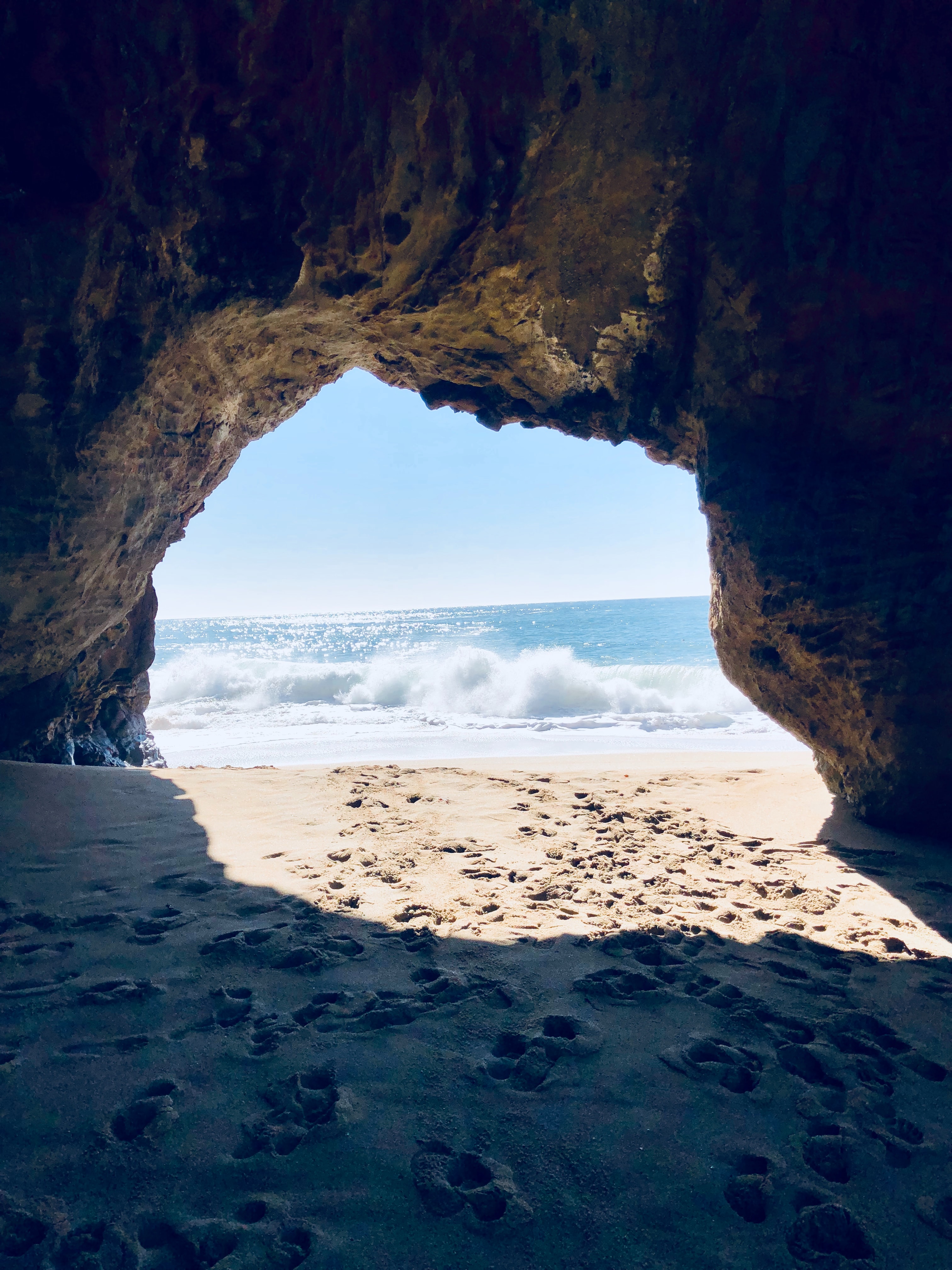 Download mobile wallpaper Sand, Arch, Nature, Cave, Sea, Beach for free.