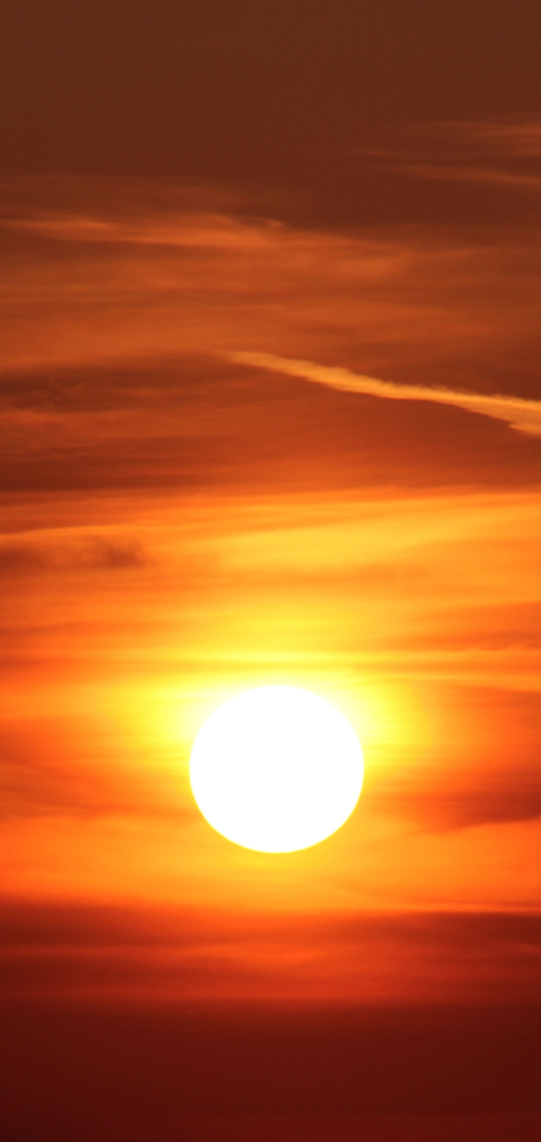 Download mobile wallpaper Nature, Sunset, Sky, Sun, Earth, Evening, Orange (Color) for free.