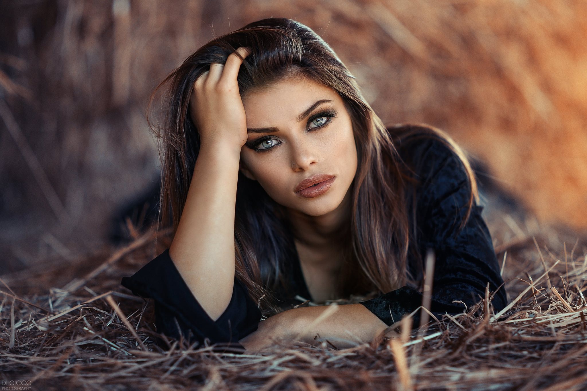 Download mobile wallpaper Brunette, Model, Women, Blue Eyes, Lying Down, Depth Of Field for free.