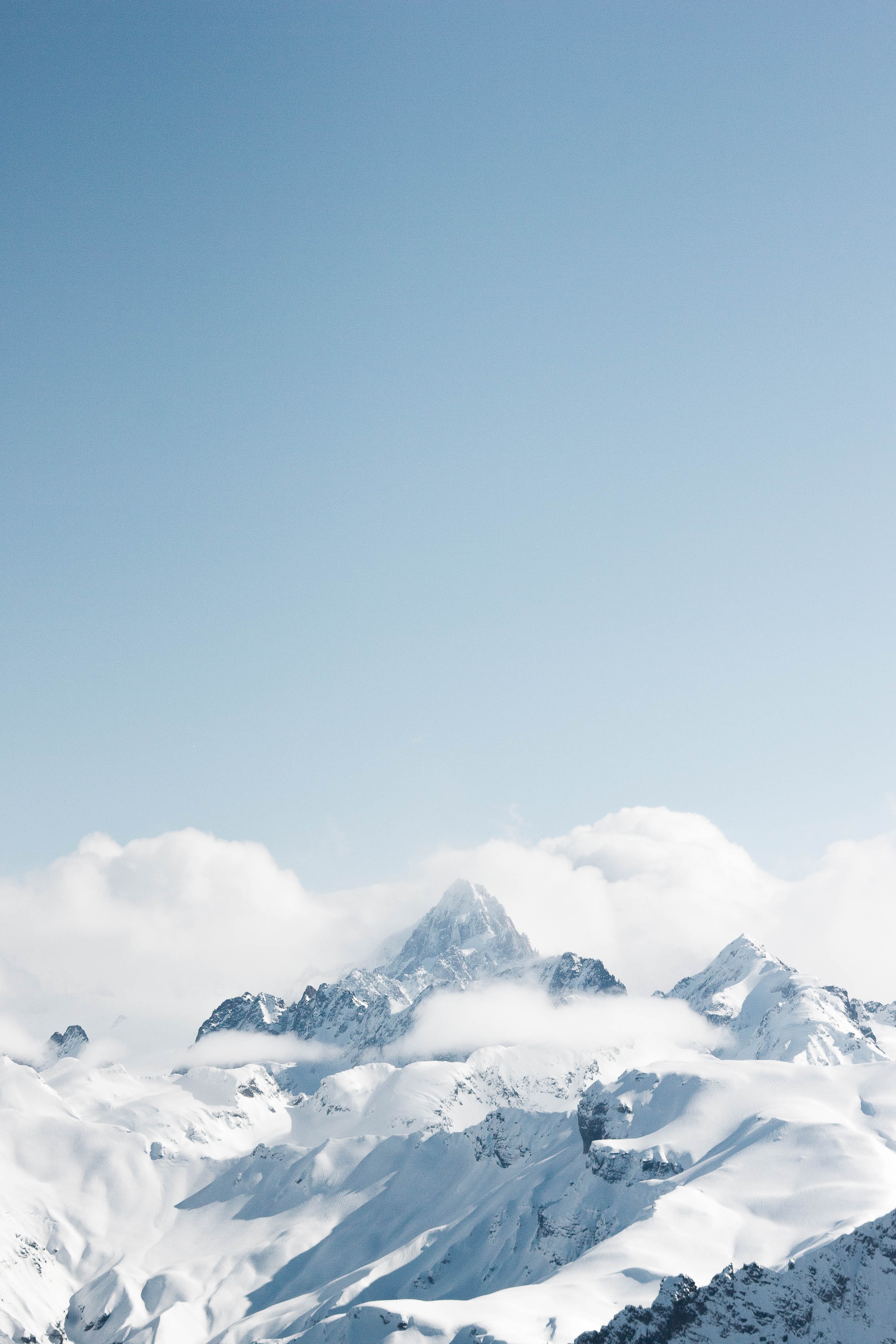 Download mobile wallpaper Top, Snow, Clouds, Vertex, Mountain, Landscape, Nature for free.