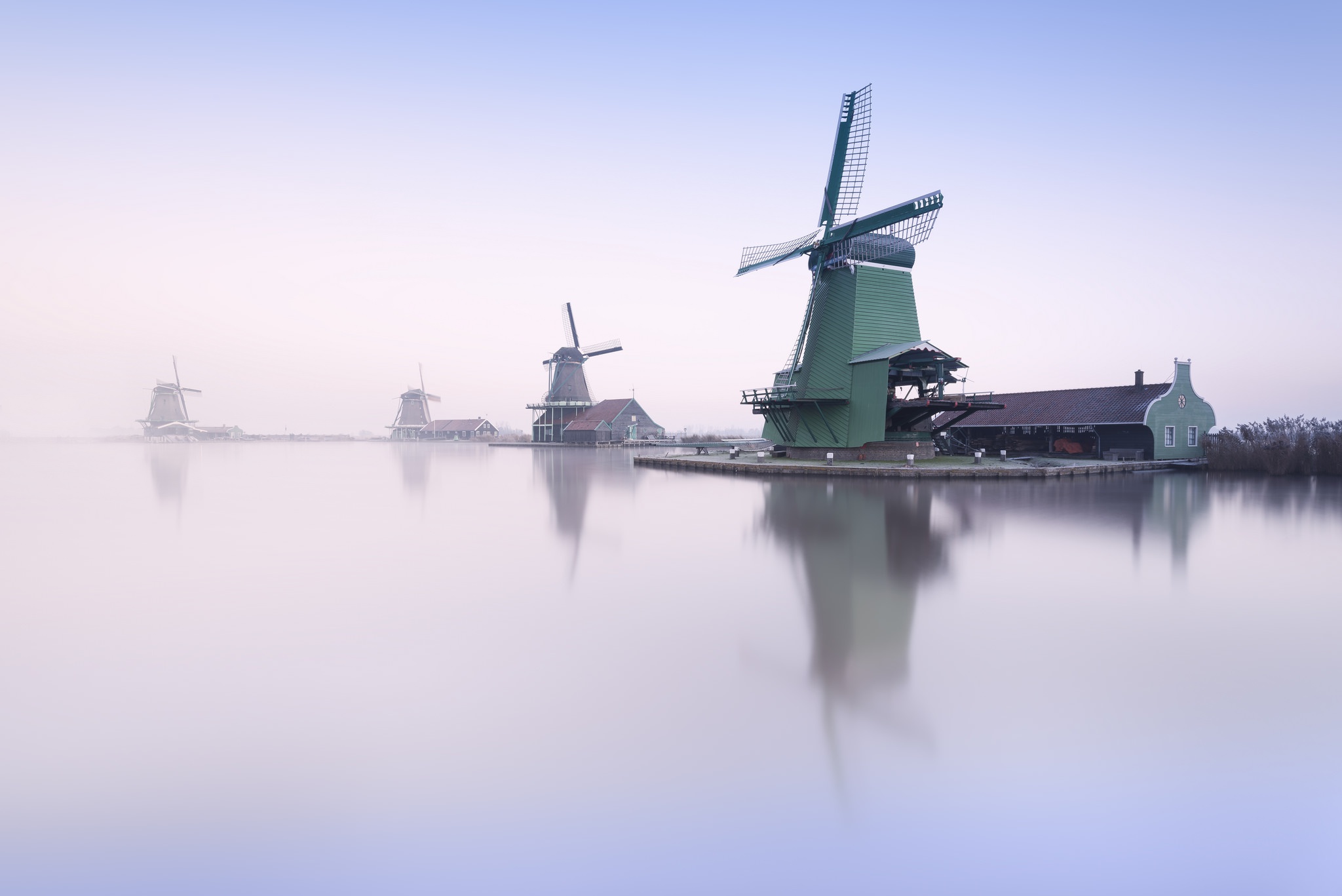 Download mobile wallpaper Building, Reflection, River, Windmill, Man Made for free.