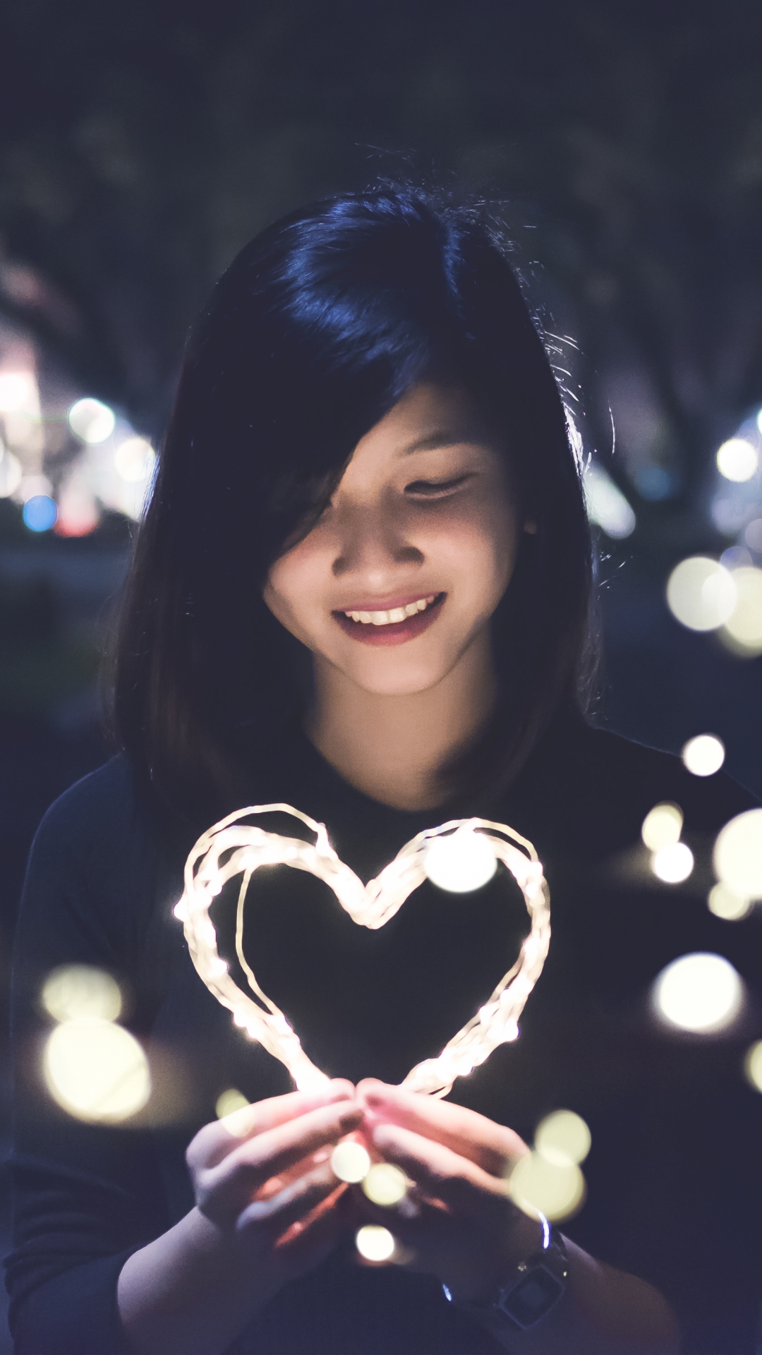 Download mobile wallpaper Night, Light, Smile, Heart, Brunette, Model, Women, Asian for free.