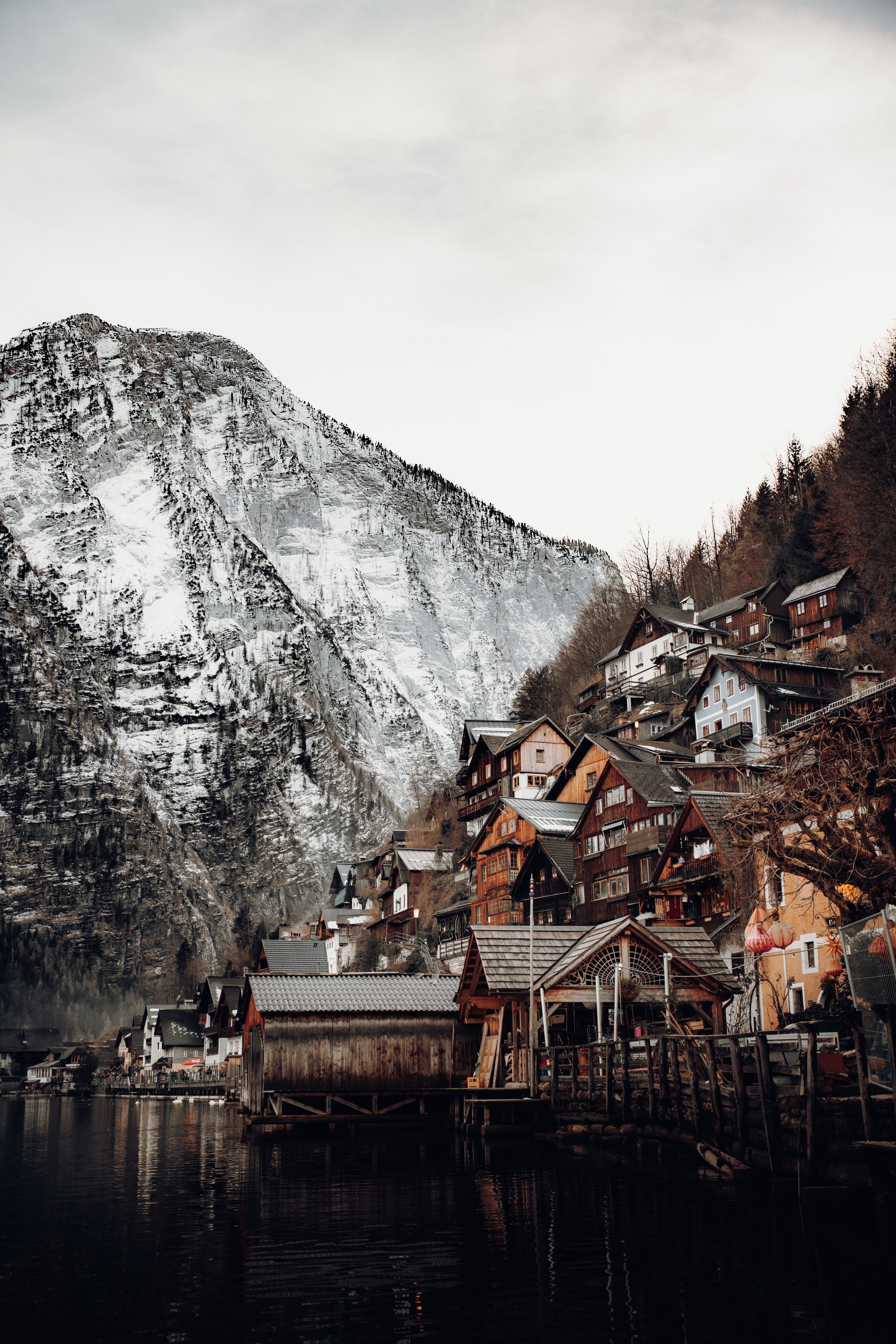 Free download wallpaper Mountains, On The River Bank, Nature, Snow, Houses on your PC desktop