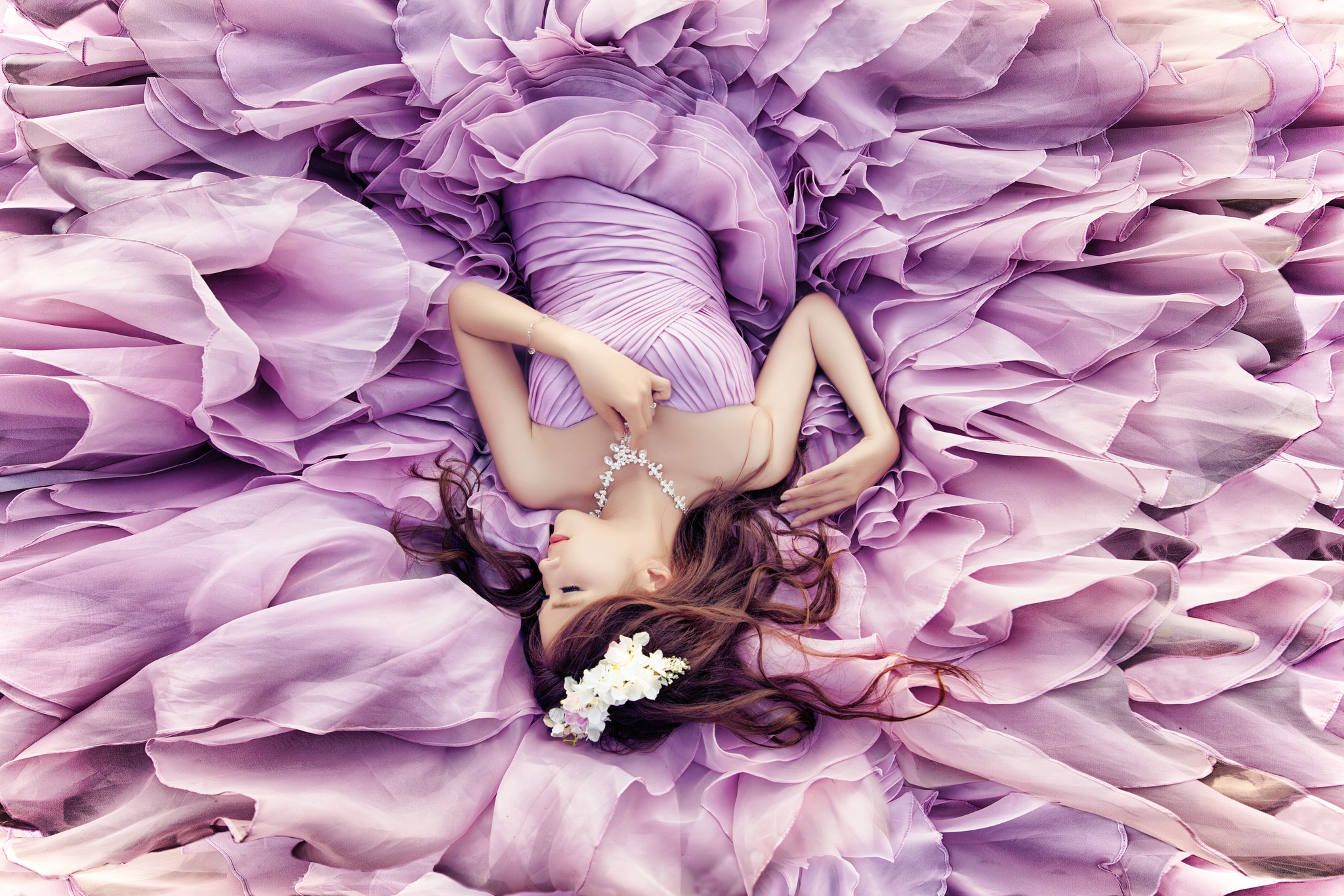 Download mobile wallpaper Purple, Mood, Dress, Brunette, Women, Necklace, Lying Down, Purple Dress, Gown for free.