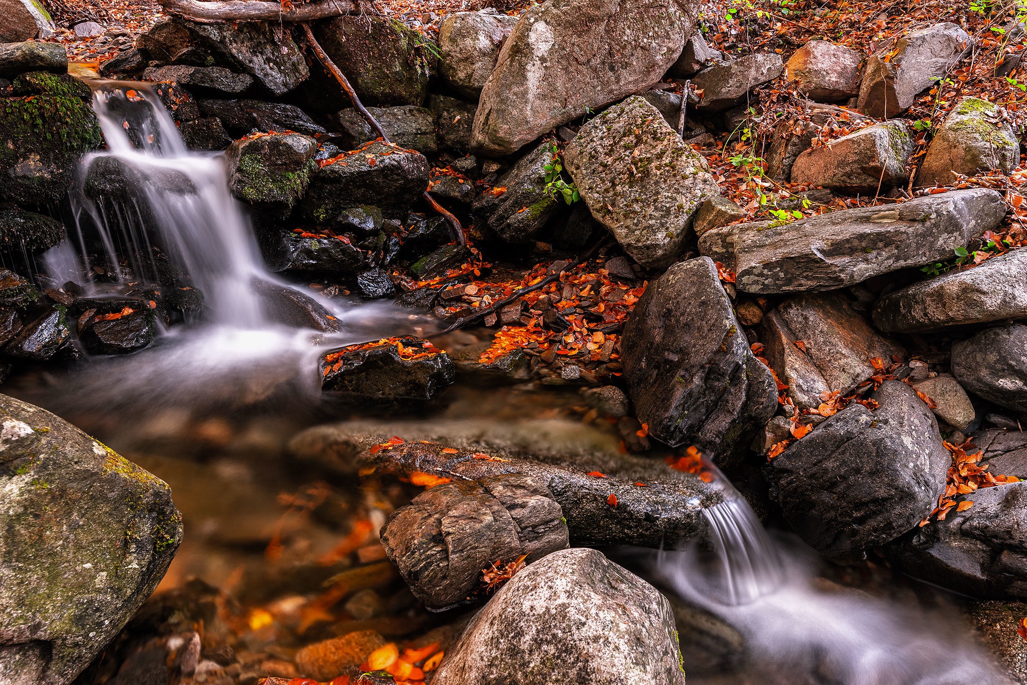 Download mobile wallpaper Waterfall, Fall, Earth, Stone, Stream, Boulder for free.