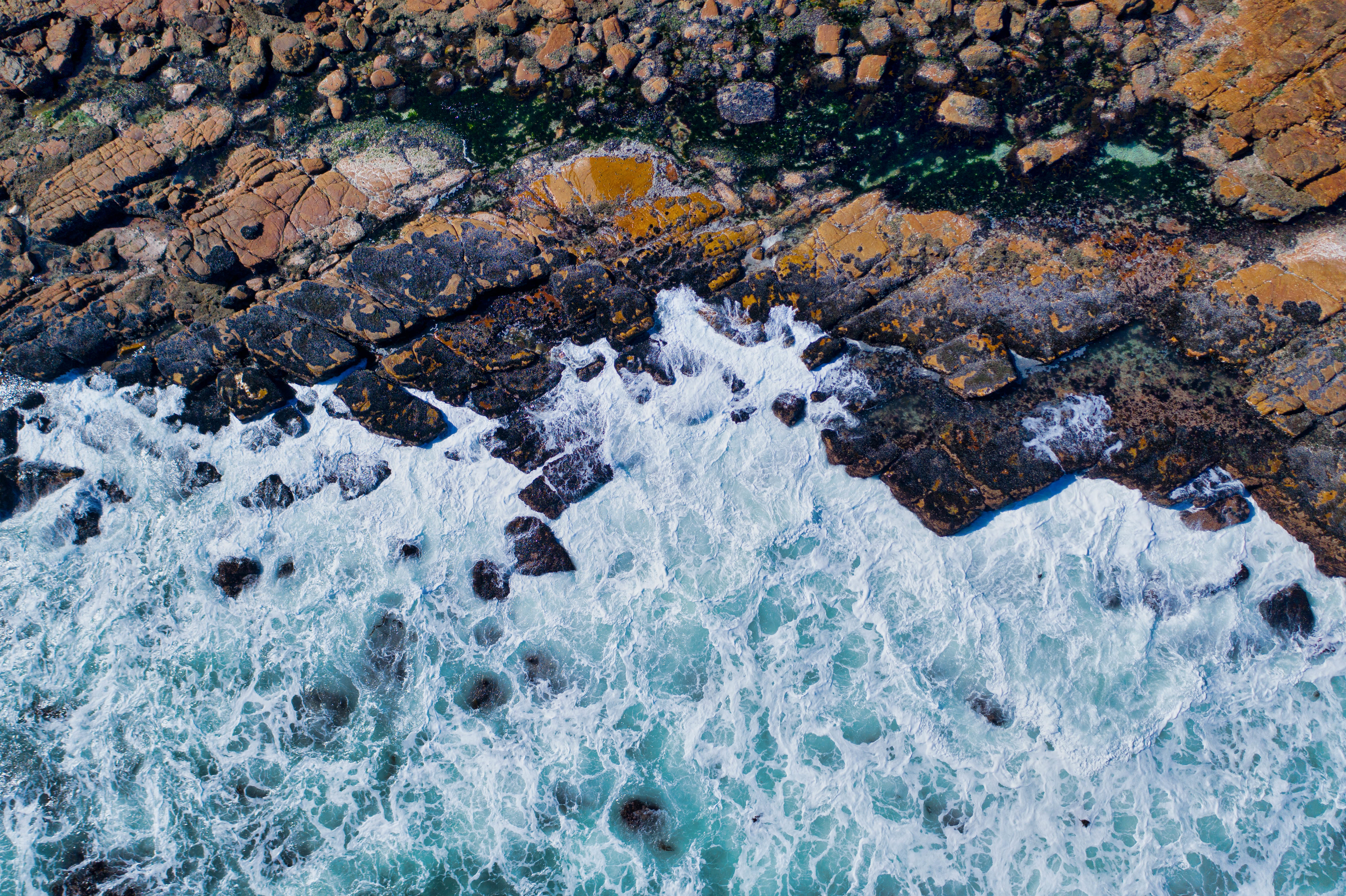 104583 Hintergrundbild herunterladen natur, stones, waves, oberfläche, flut, tide - Bildschirmschoner und Bilder kostenlos
