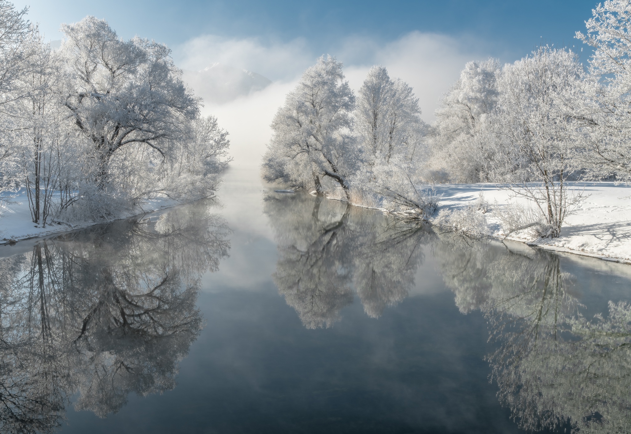 Download mobile wallpaper Winter, Nature, Snow, Reflection, Tree, Fog, Earth, River for free.