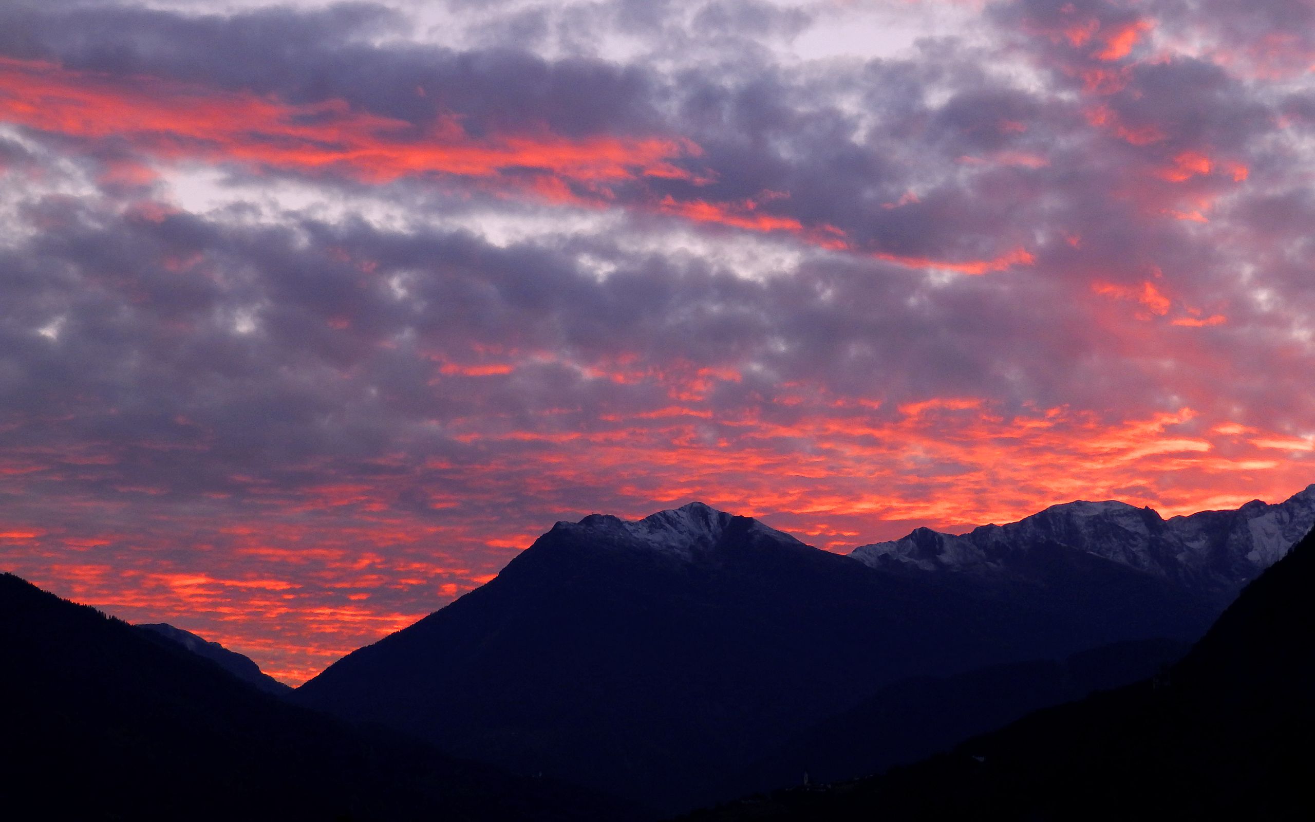 Download mobile wallpaper Landscape, Nature, Sunset, Mountain, Earth, Cloud, Orange (Color) for free.