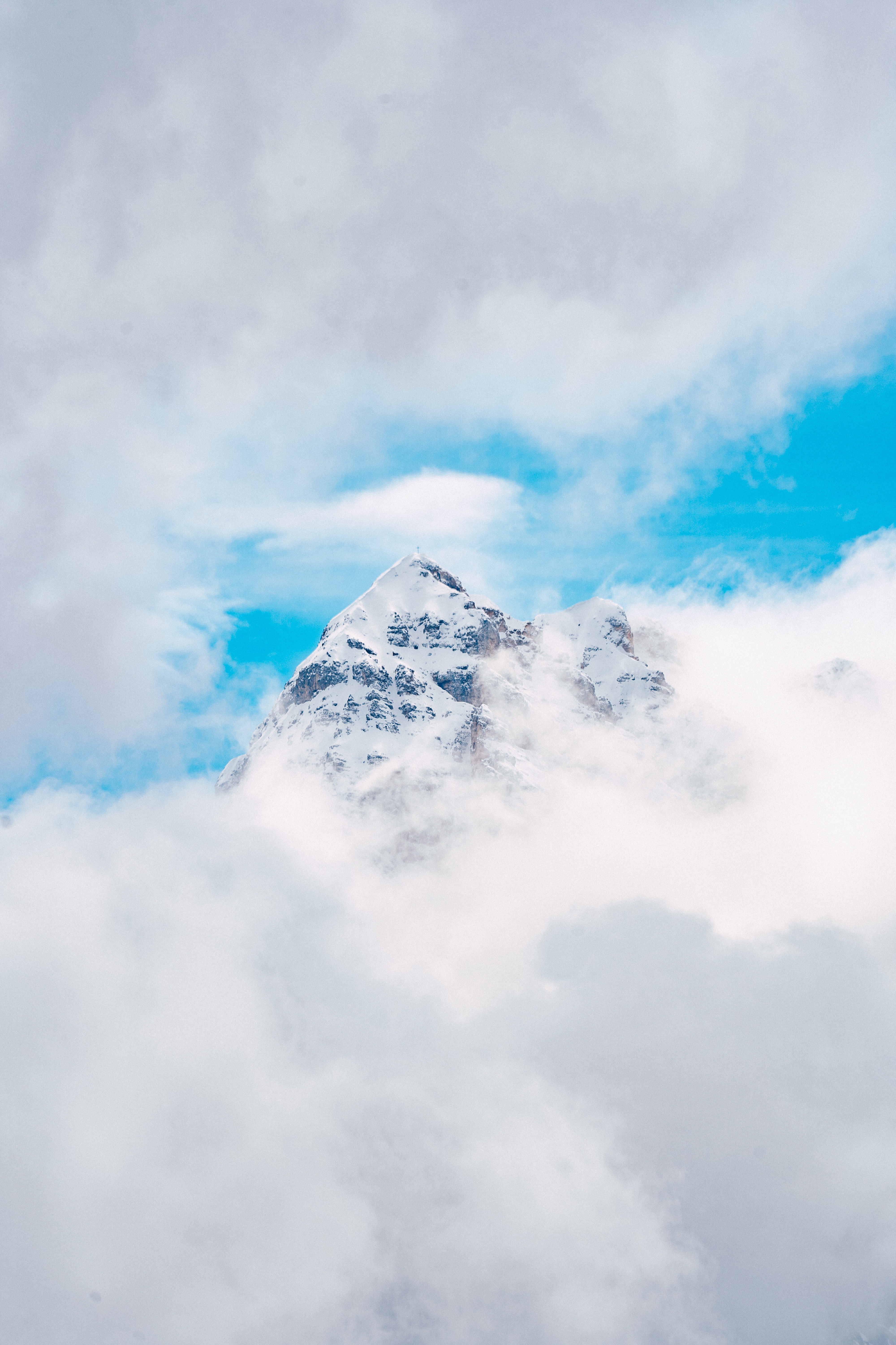 Download mobile wallpaper Top, Peak, Height, Vertex, Clouds, Mountain, Nature for free.