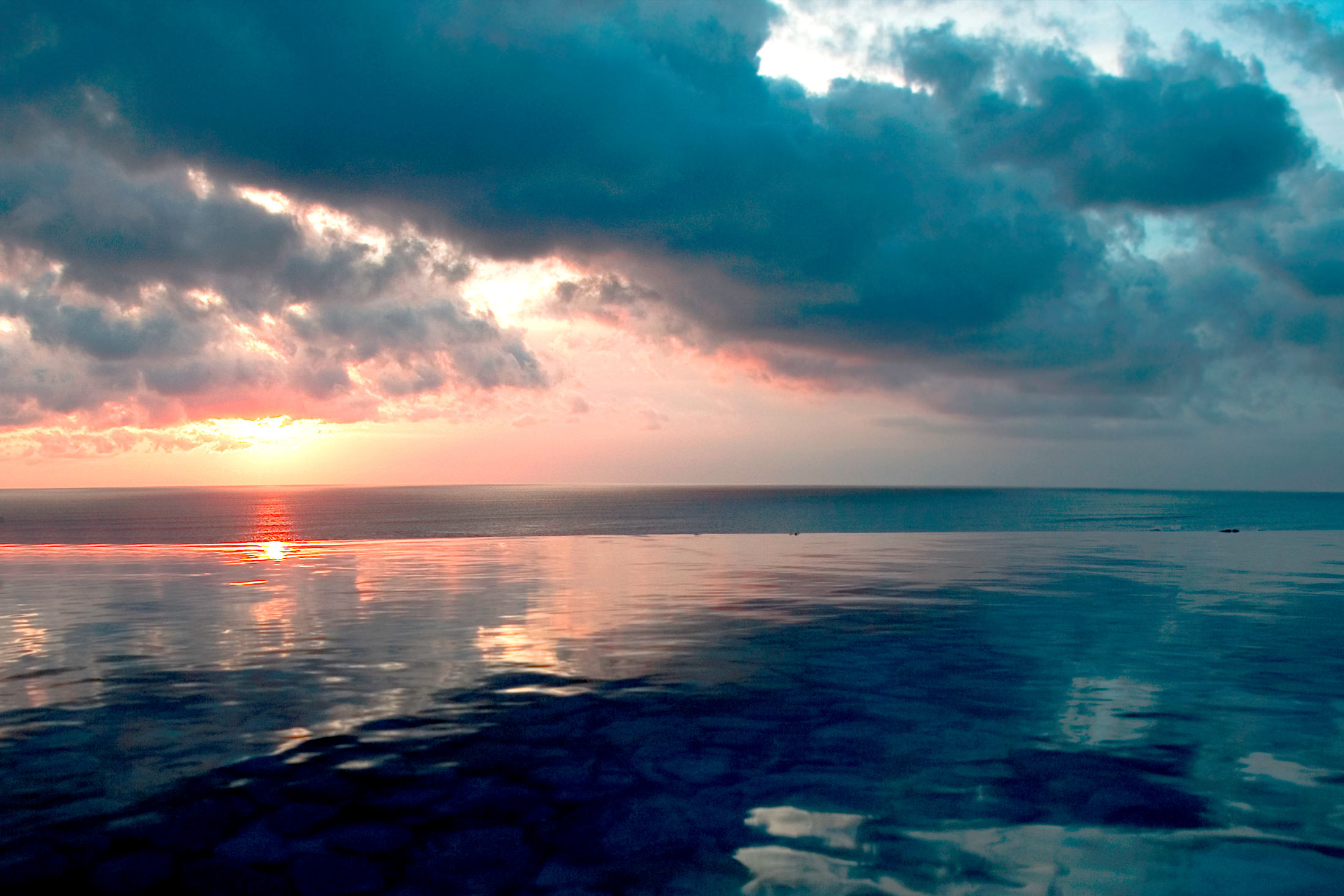 Download mobile wallpaper Sunset, Sea, Horizon, Ocean, Earth, Cloud, Indonesia for free.