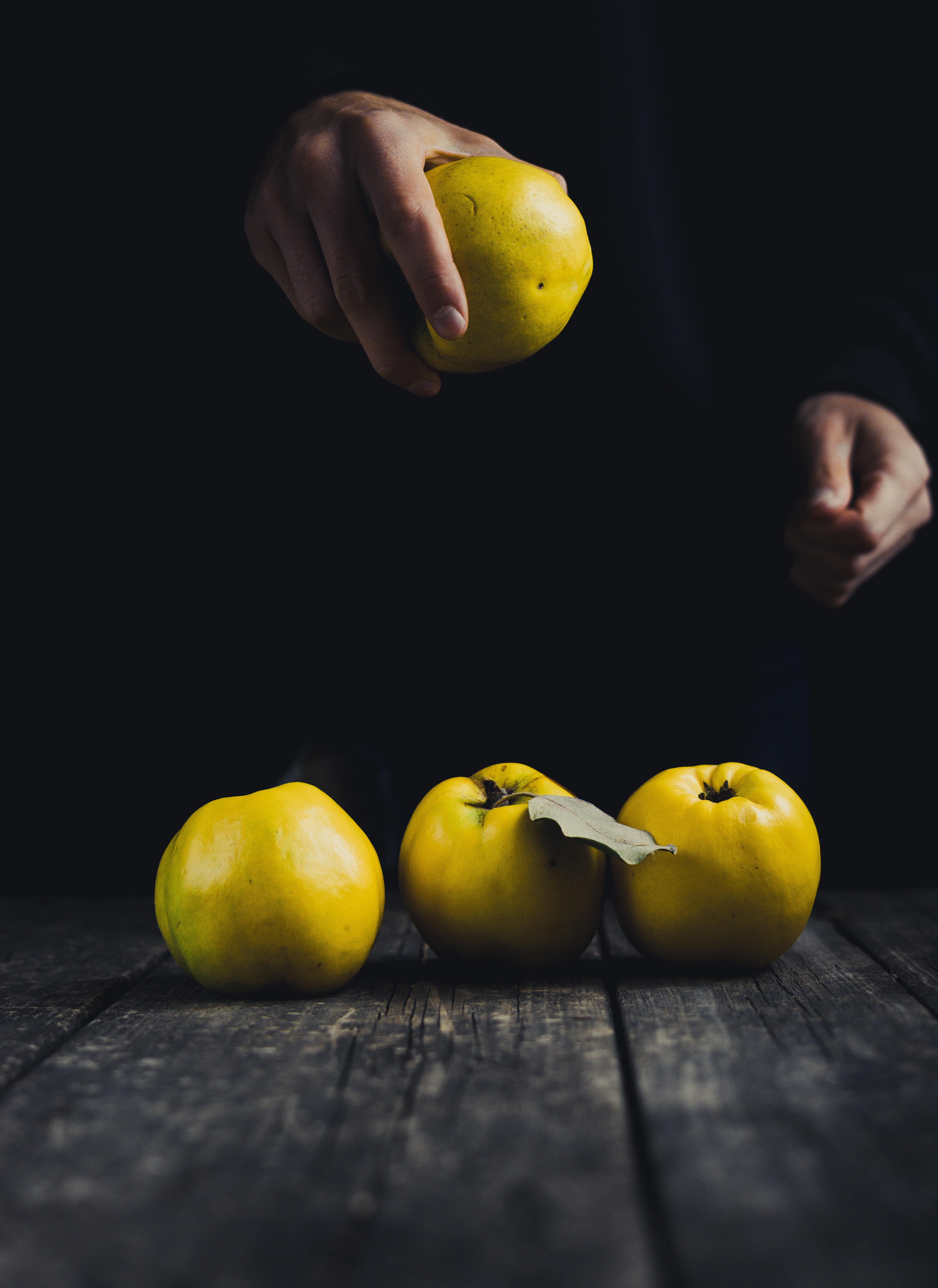 dark background, food, apple, hand, fruit HD wallpaper