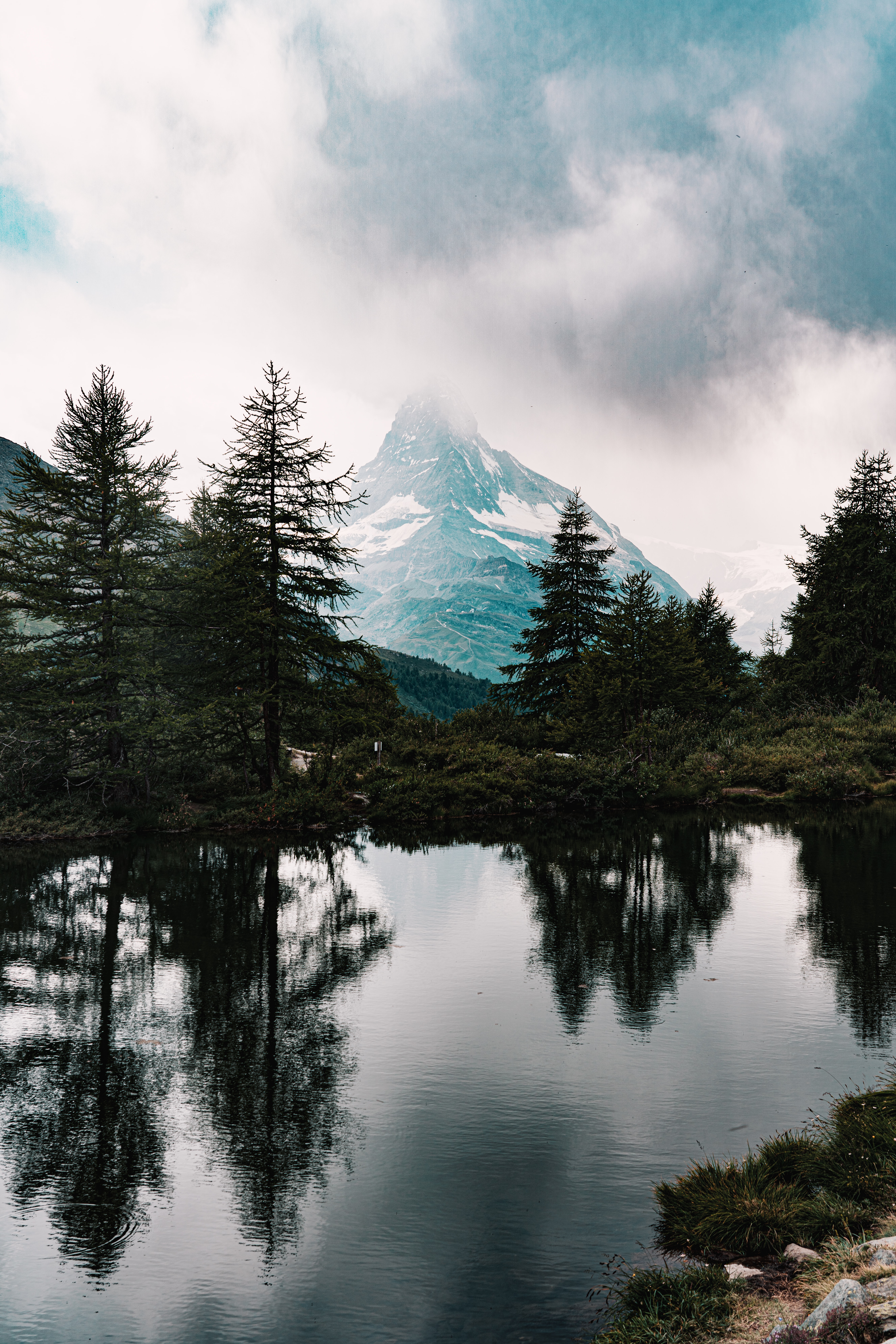 Download mobile wallpaper Clouds, Fir, Spruce, Mountains, Lake, Reflection, Nature for free.