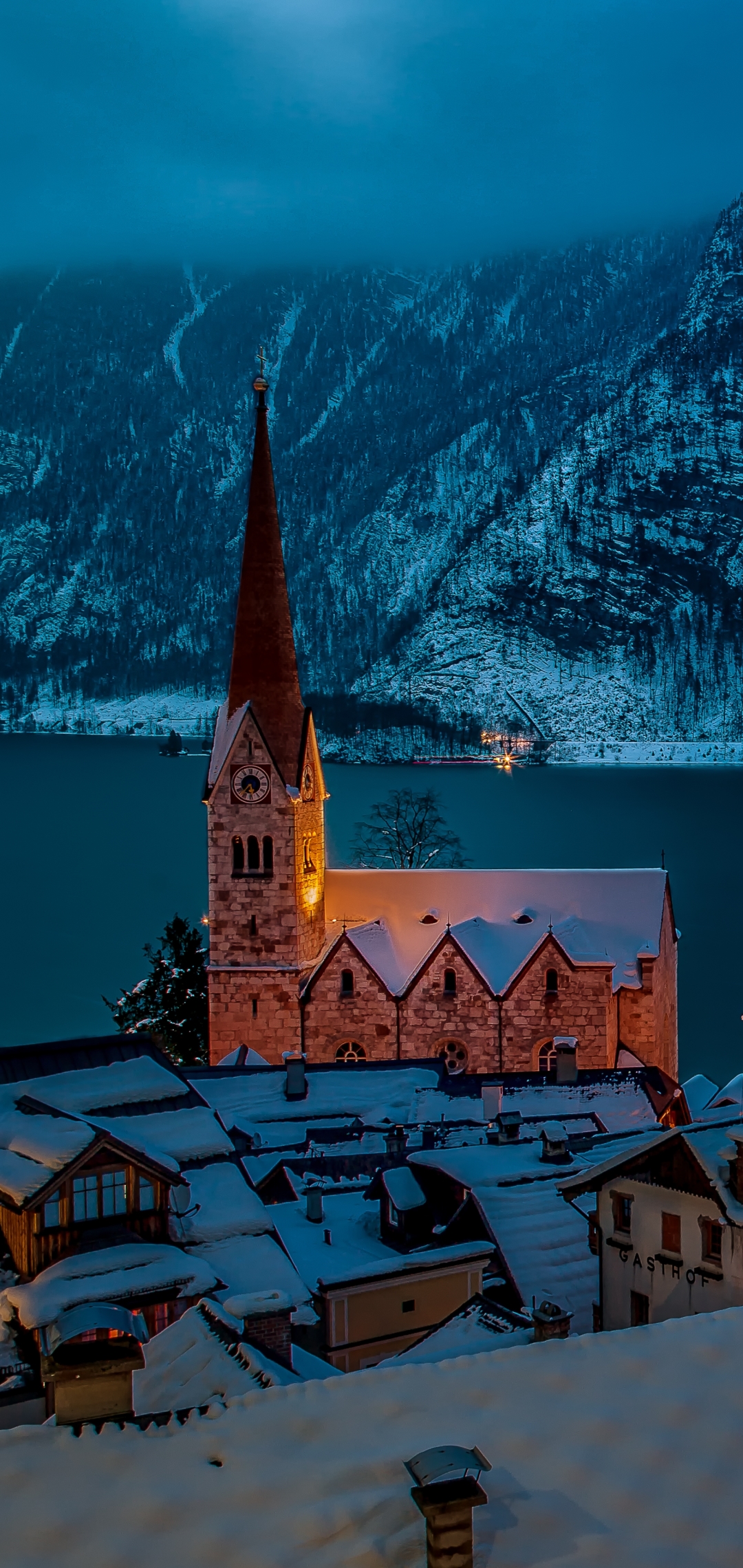 Download mobile wallpaper Winter, Night, Snow, Town, Hallstatt, Man Made, Towns for free.