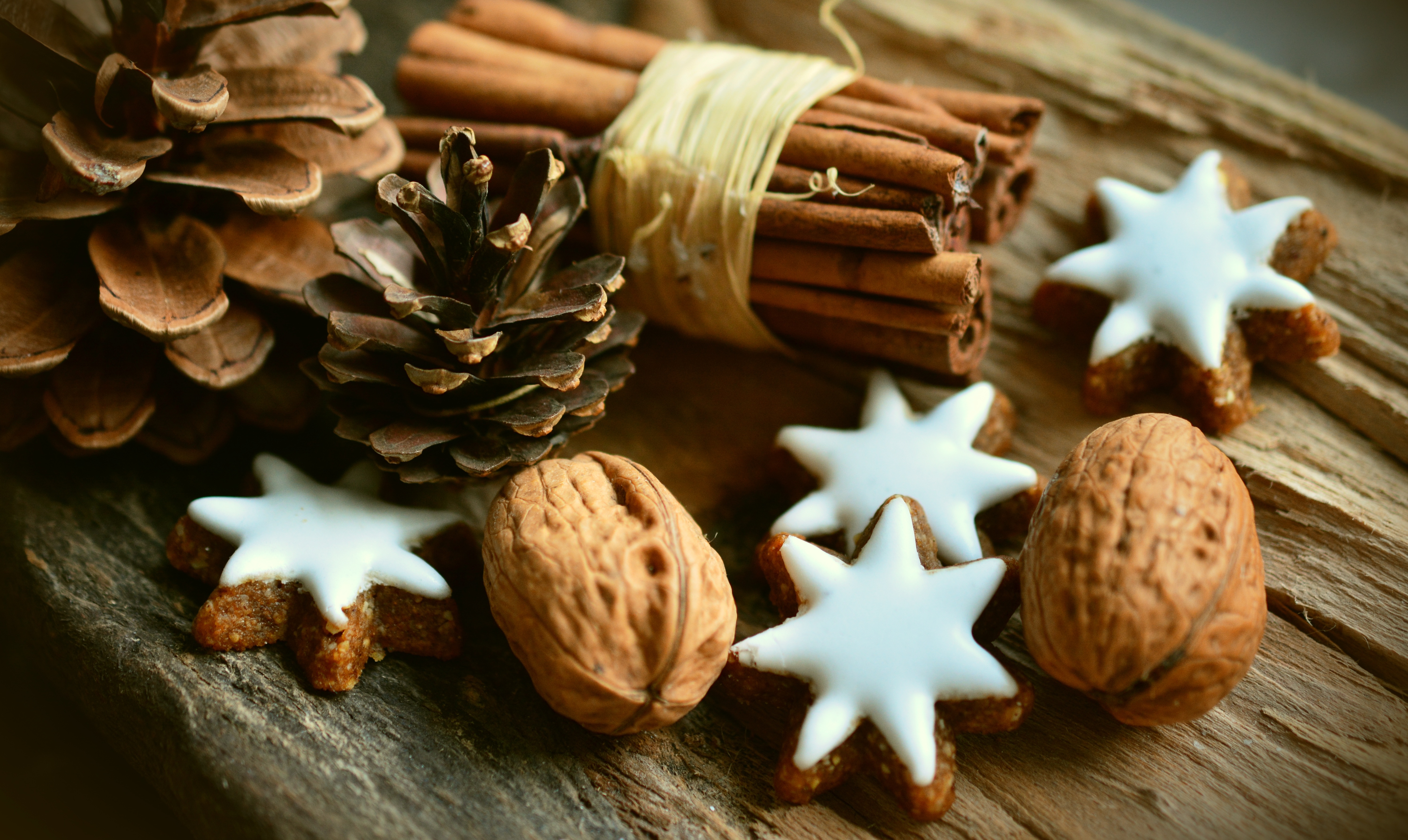 Download mobile wallpaper Food, Cinnamon, Wood, Christmas, Star, Nut, Cookie for free.