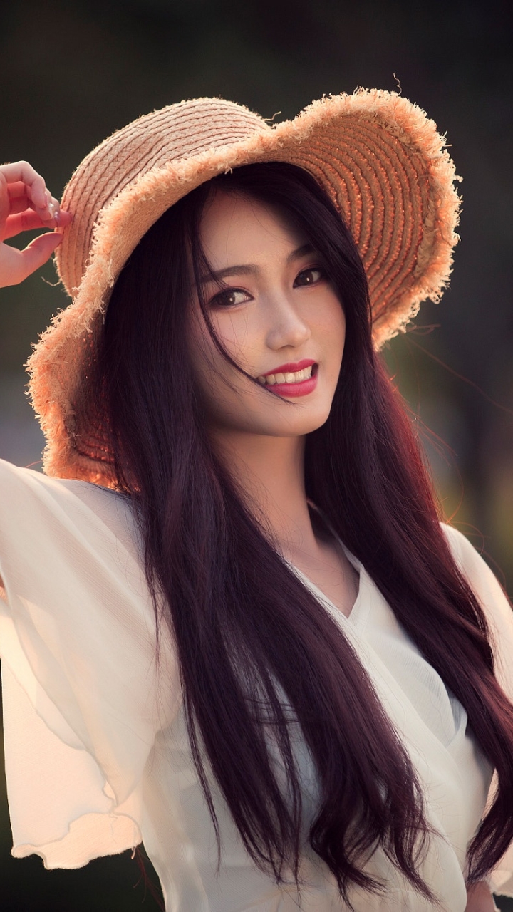 Download mobile wallpaper Smile, Hat, Model, Women, Asian, Long Hair for free.