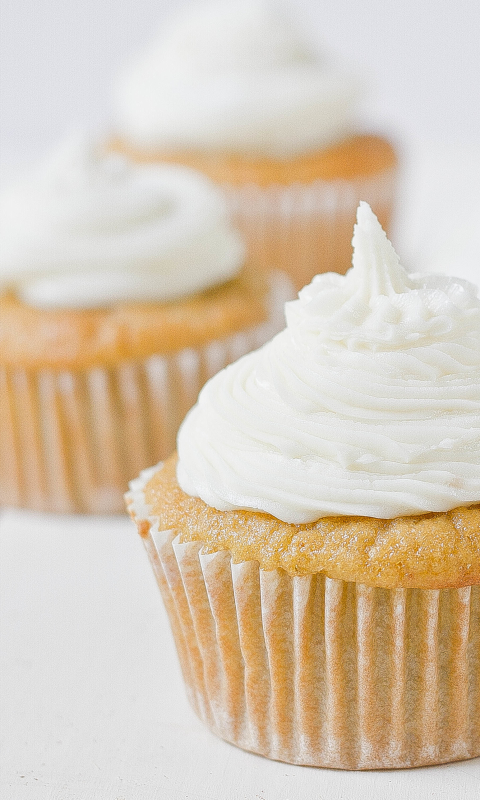 1256206 Bildschirmschoner und Hintergrundbilder Vanille Cupcake auf Ihrem Telefon. Laden Sie  Bilder kostenlos herunter