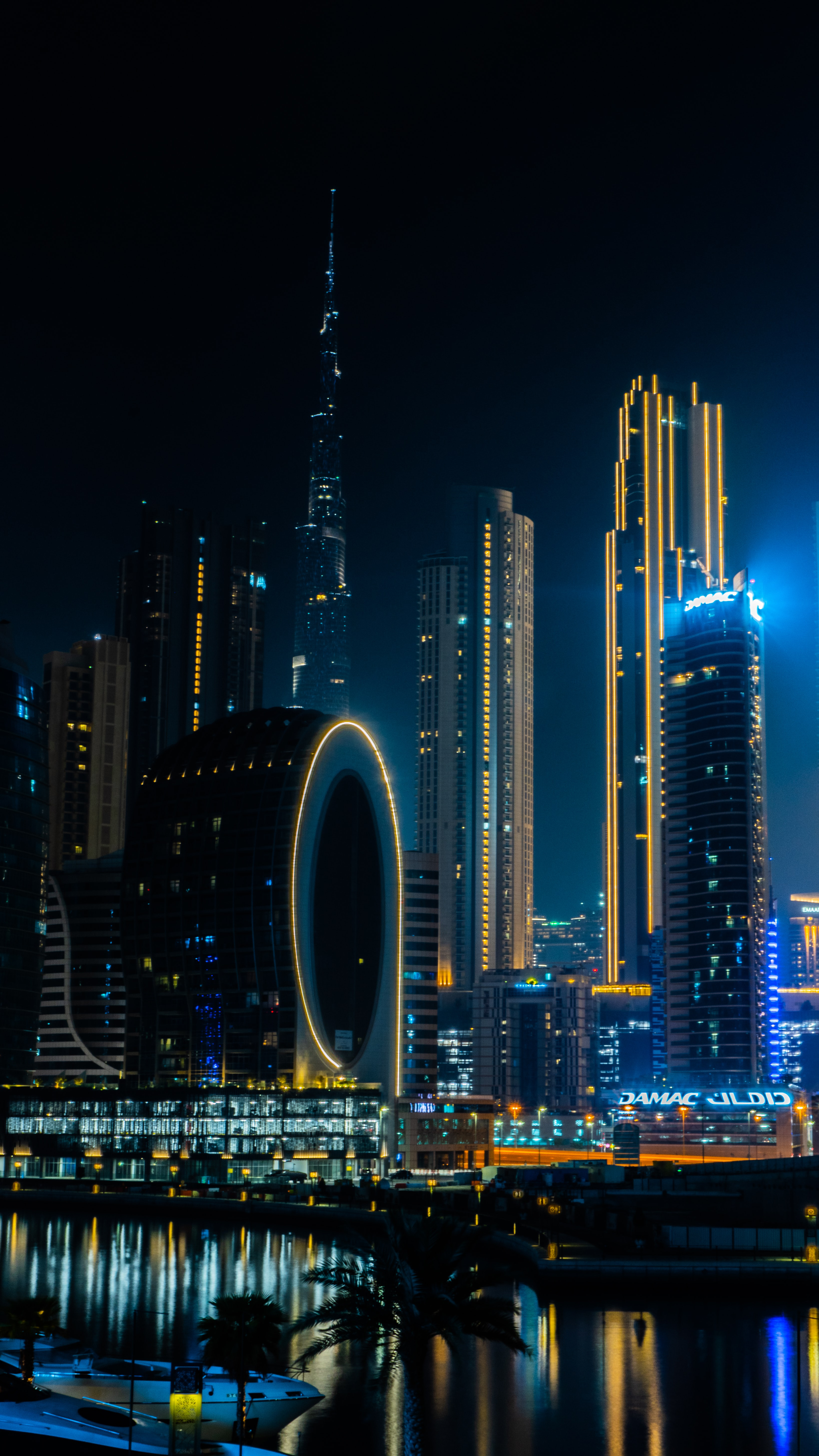 103158 télécharger l'image dubaï, grattes ciels, villes, nuit, gratte ciel, imeuble, bâtiment, dubai, rétroéclairage, illumination, émirats arabes unis, e a u - fonds d'écran et économiseurs d'écran gratuits