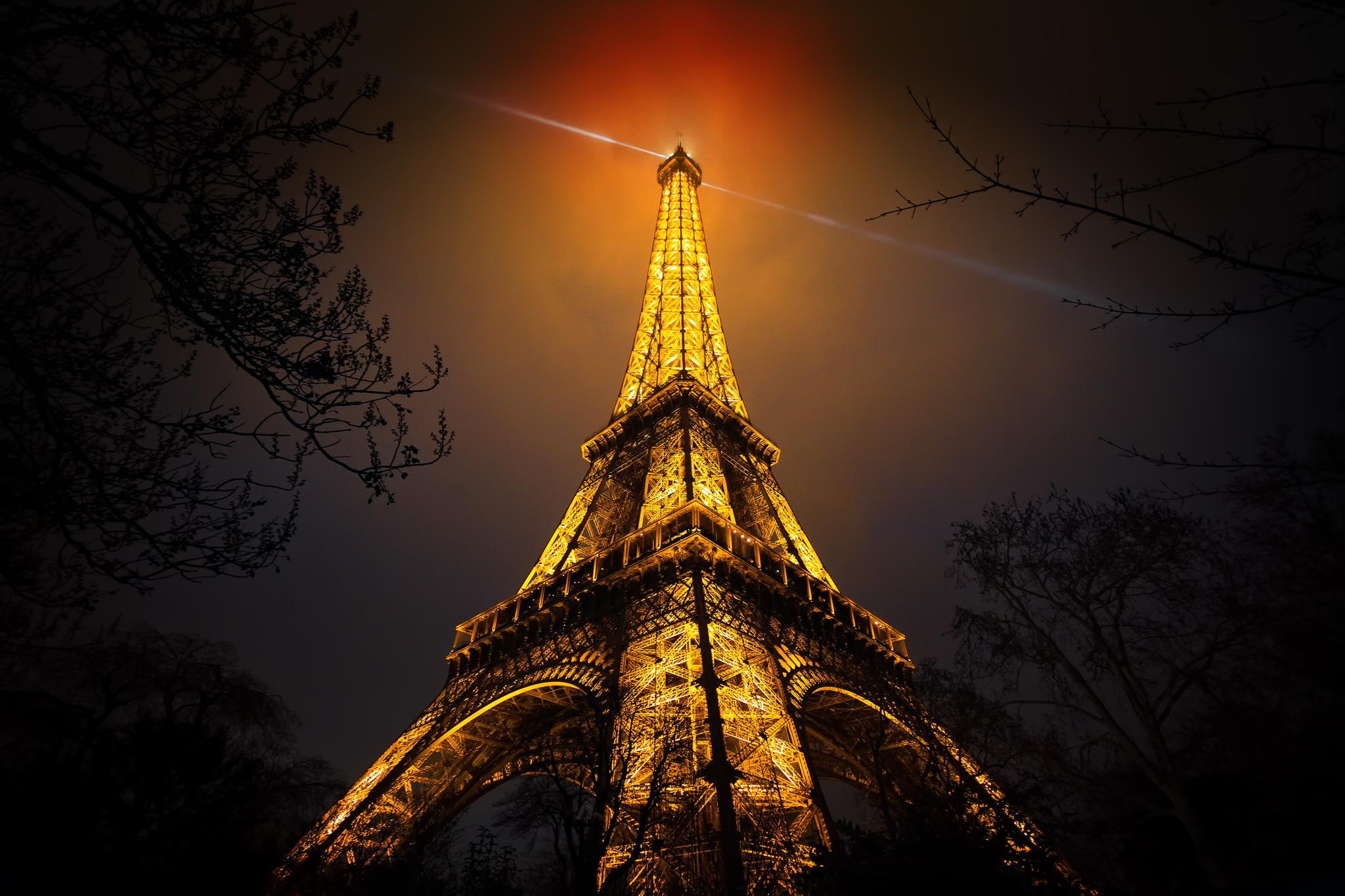 Download mobile wallpaper Night, Eiffel Tower, Monuments, Light, Close Up, Man Made for free.