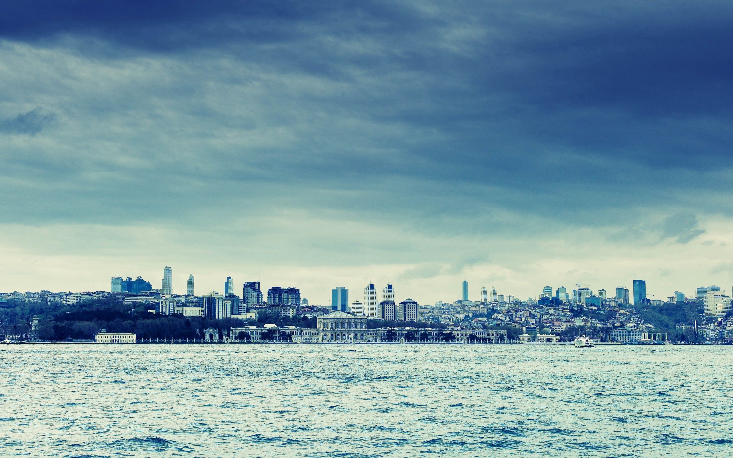 Download mobile wallpaper Bank, Cities, Waves, City, Shore, Building, Sea for free.