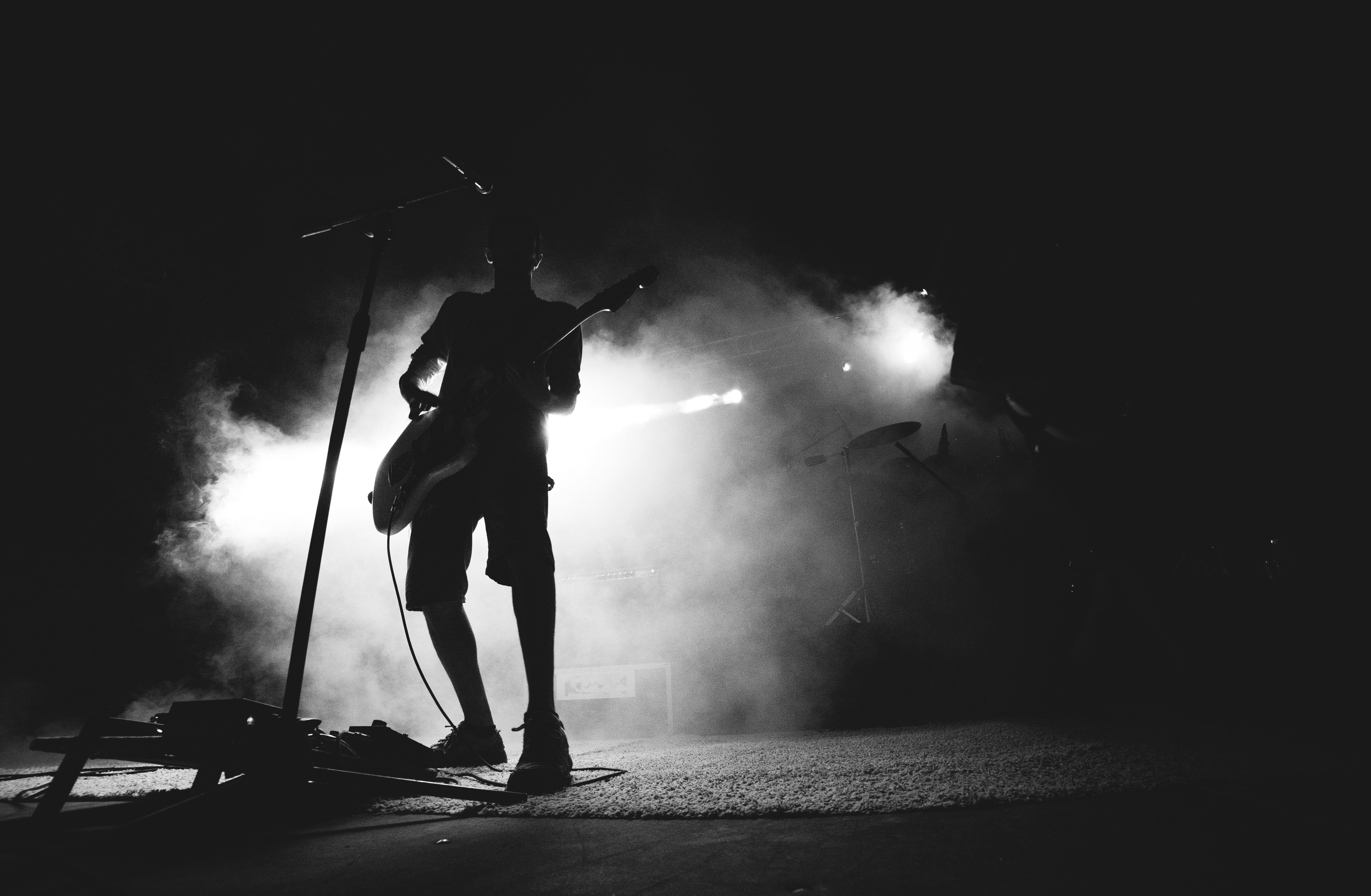 guitar player, guitarist, black and white, black, smoke, musician, concert, microphone, performance