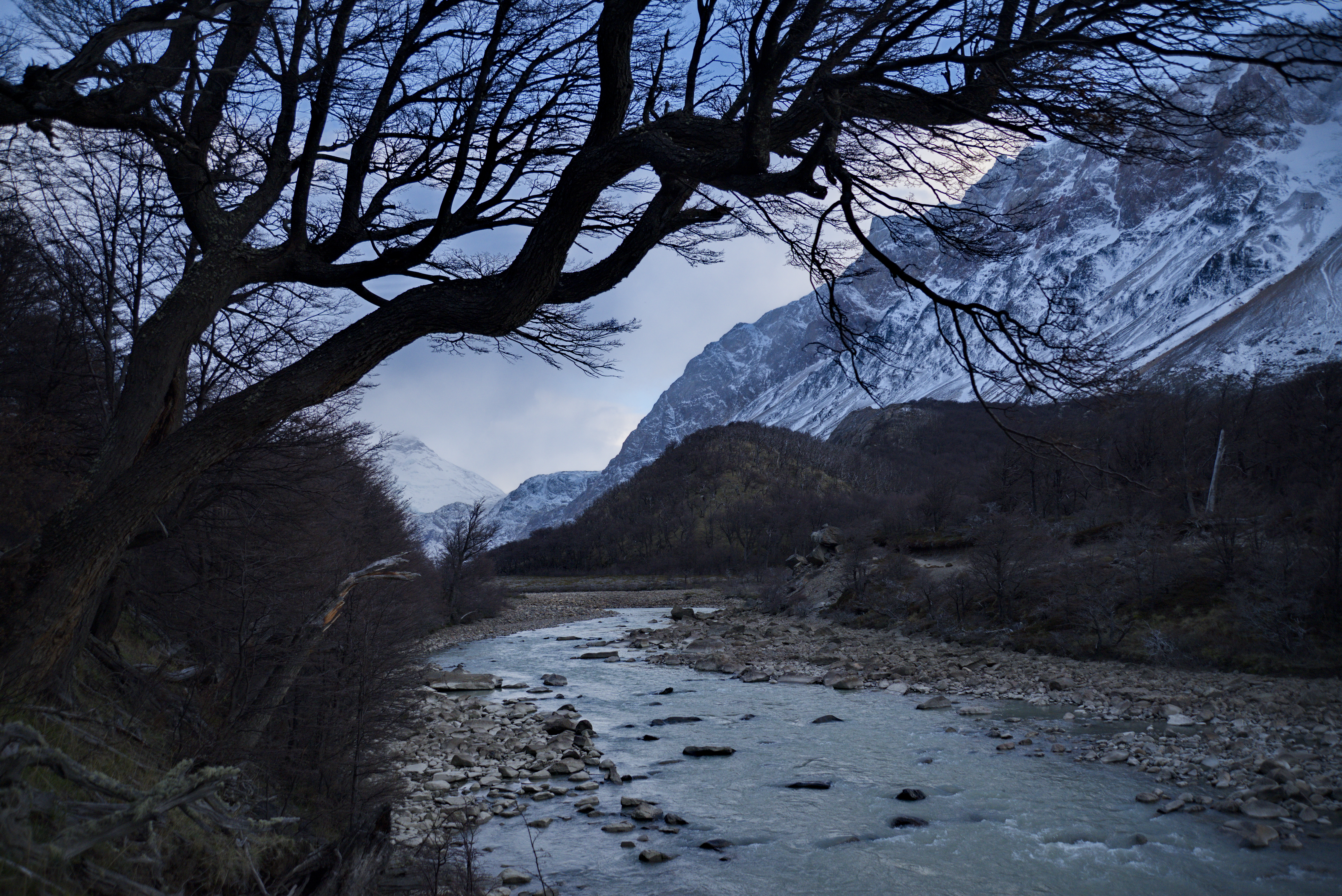 Download mobile wallpaper Branches, Hill, Stones, Mountains, Rivers, Nature for free.