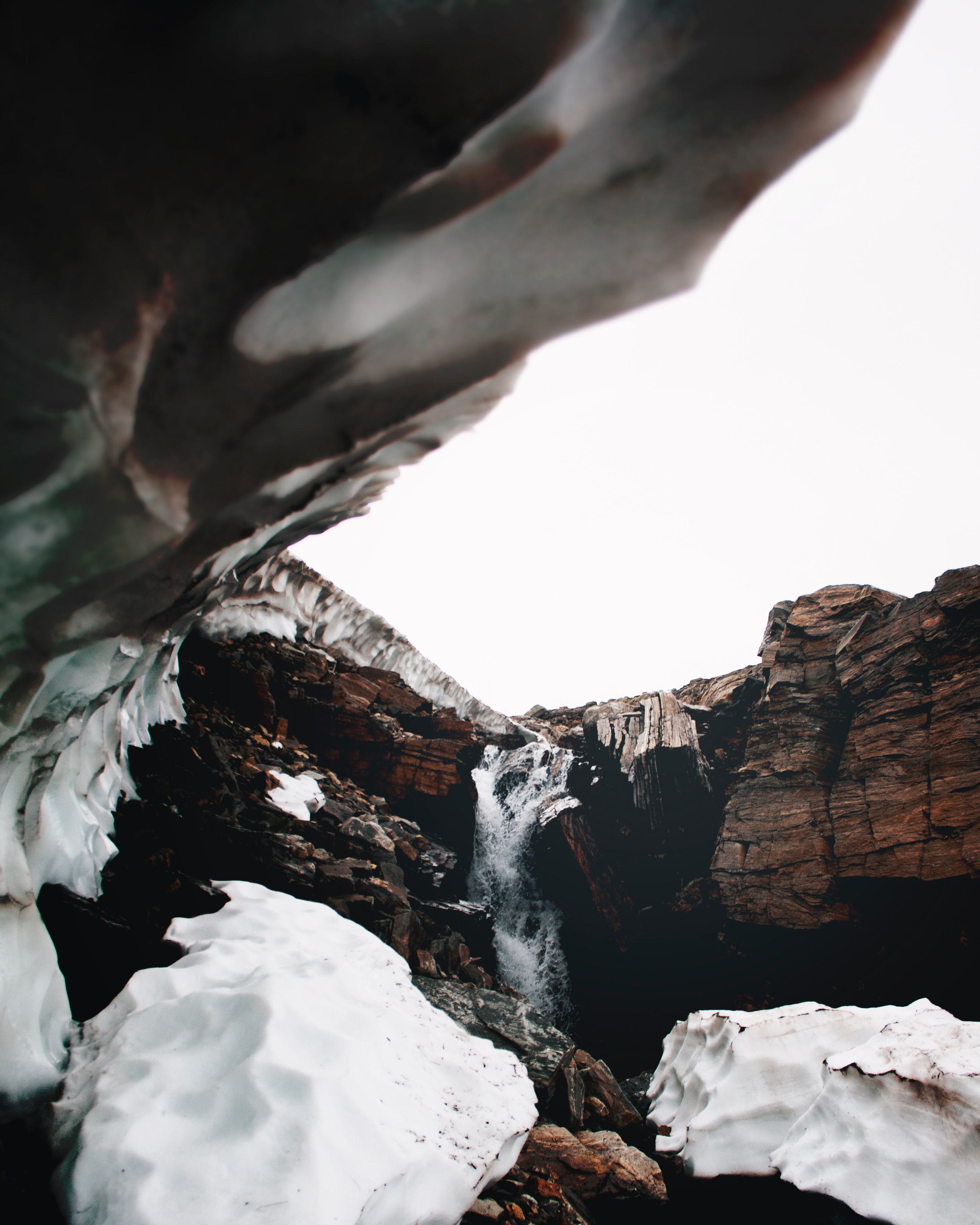 Download mobile wallpaper Snow, Rocks, Gorge, Waterfall, Nature for free.