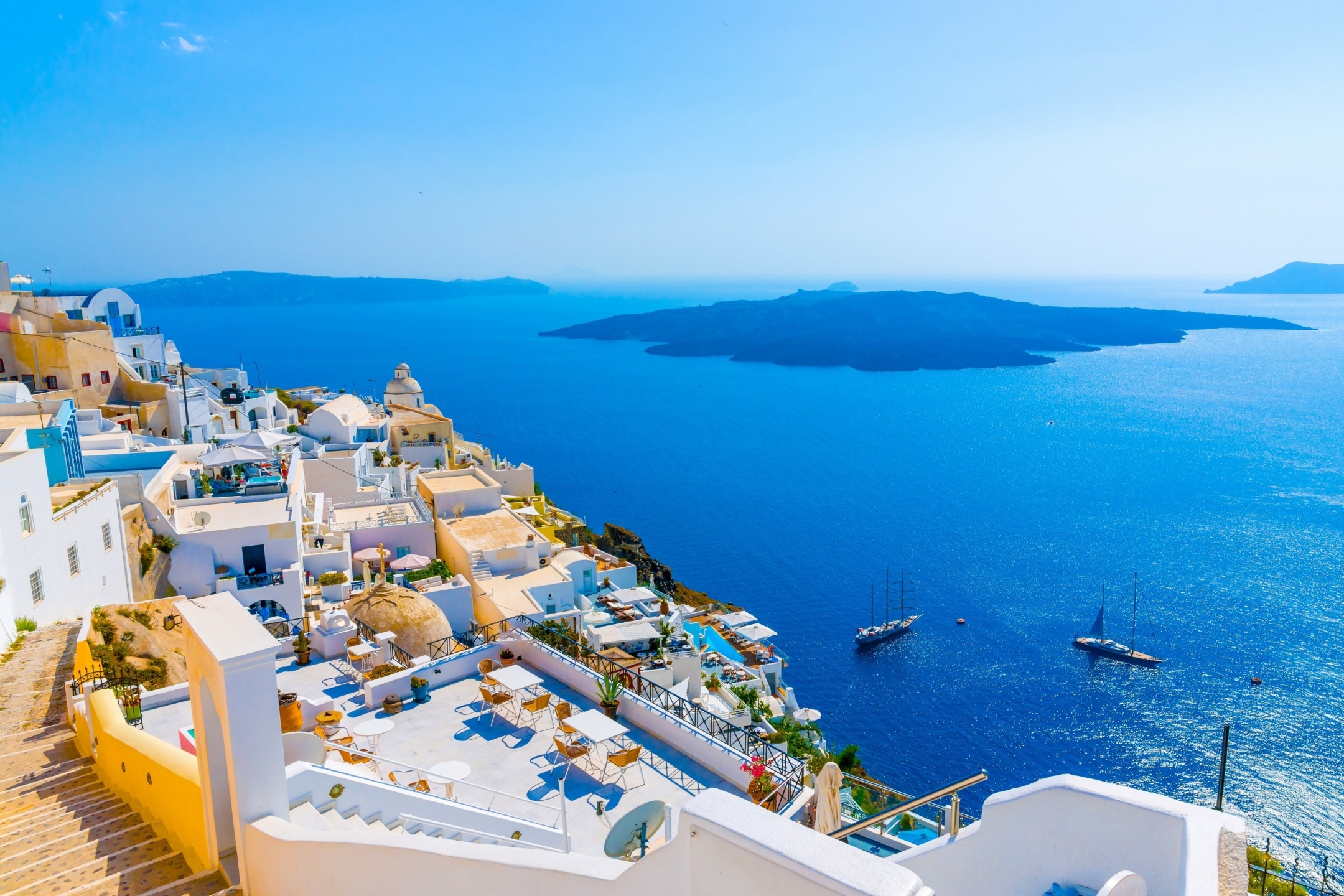 Download mobile wallpaper Island, Greece, Santorini, Man Made, Sunshine, Towns for free.