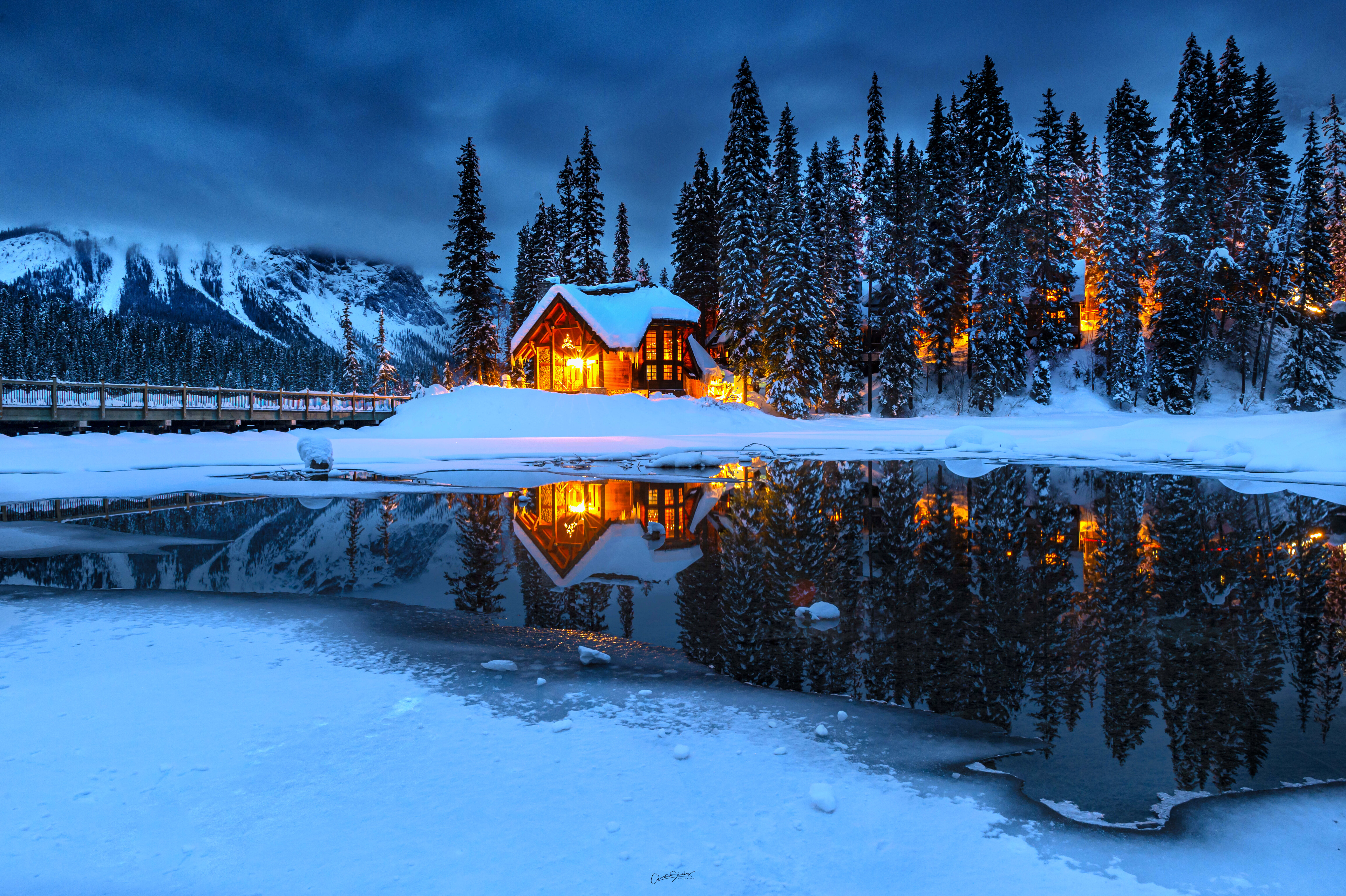 Download mobile wallpaper Snow, Mountain, Lake, Forest, Bridge, Hut, Man Made for free.