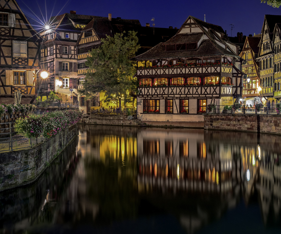 Download mobile wallpaper Cities, Night, City, Building, Reflection, France, Strasbourg, Man Made, Canal for free.