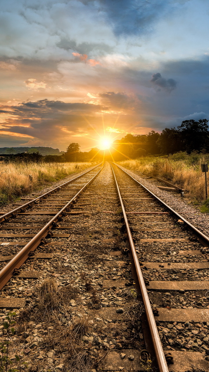 Download mobile wallpaper Sun, Sunrise, Railroad, Man Made for free.