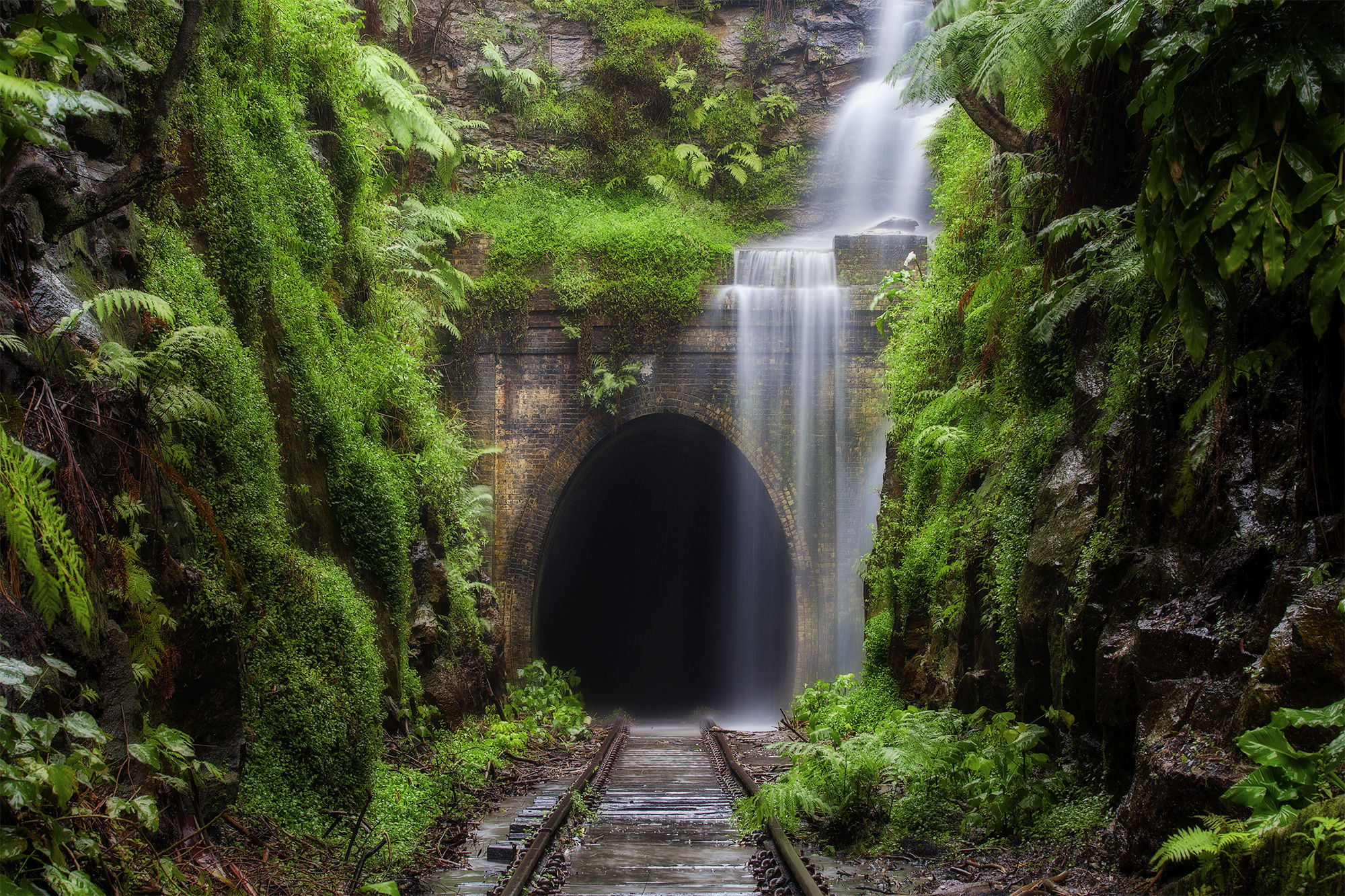 Free download wallpaper Waterfall, Moss, Tunnel, Railroad, Man Made on your PC desktop