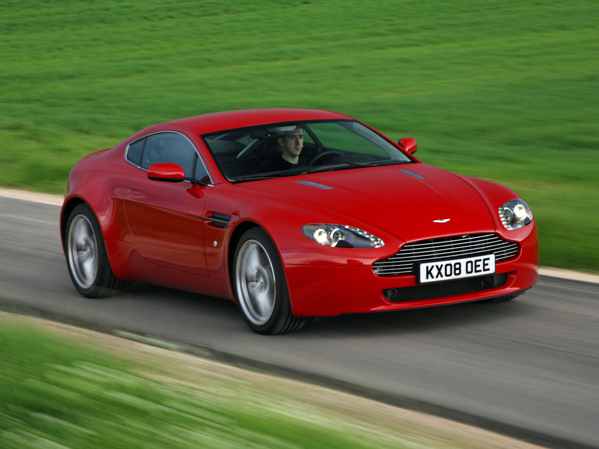Free download wallpaper Grass, Cars, 2008, V8, Vantage, Aston Martin, Front View on your PC desktop