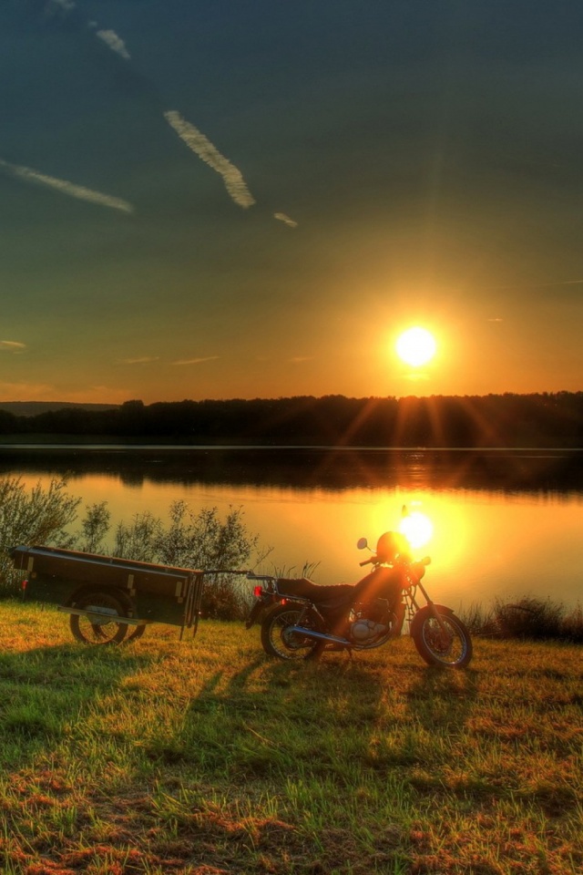 Download mobile wallpaper Water, Sunset, Grass, Sun, Motorcycles, Lake, Reflection, Motorcycle, Vehicles for free.