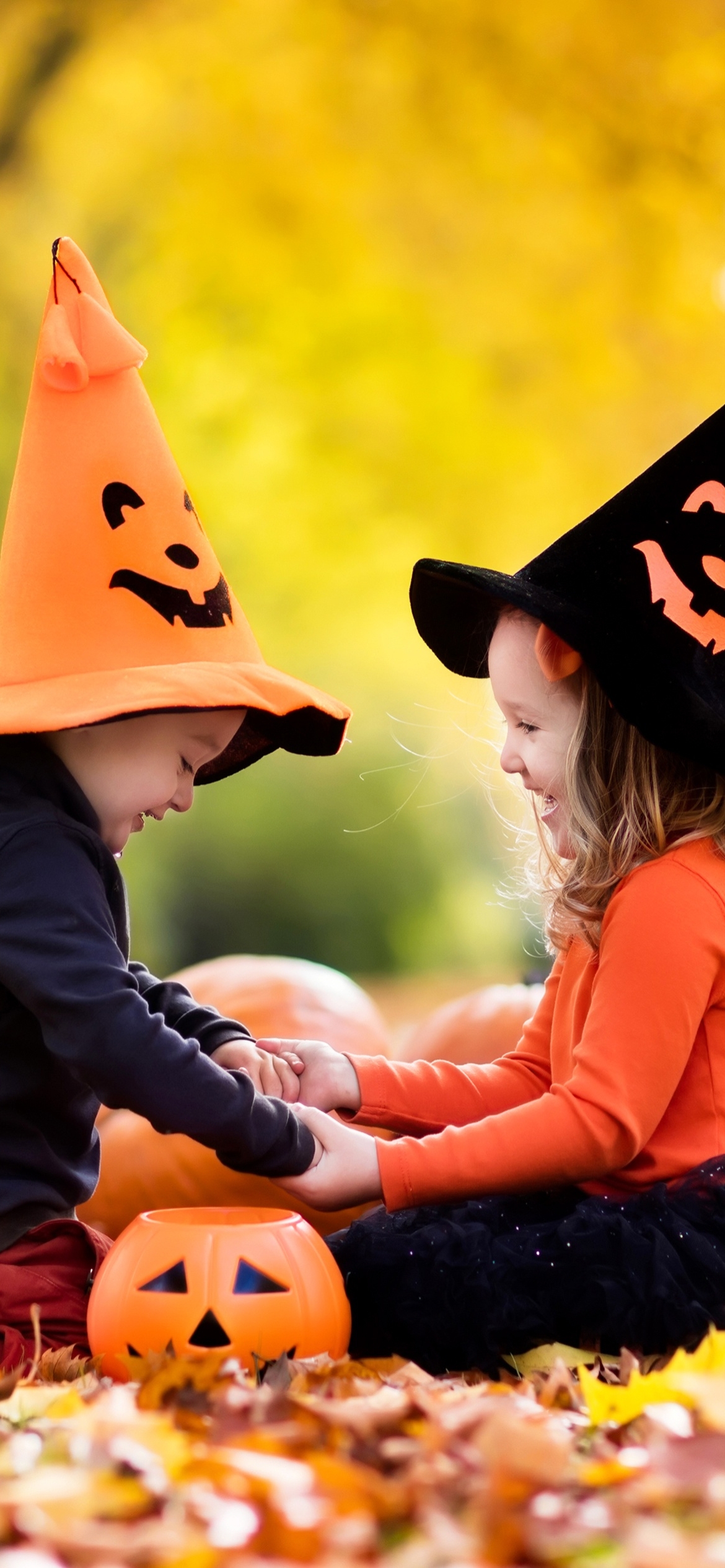 Download mobile wallpaper Halloween, Pumpkin, Holiday, Child, Little Girl, Little Boy for free.