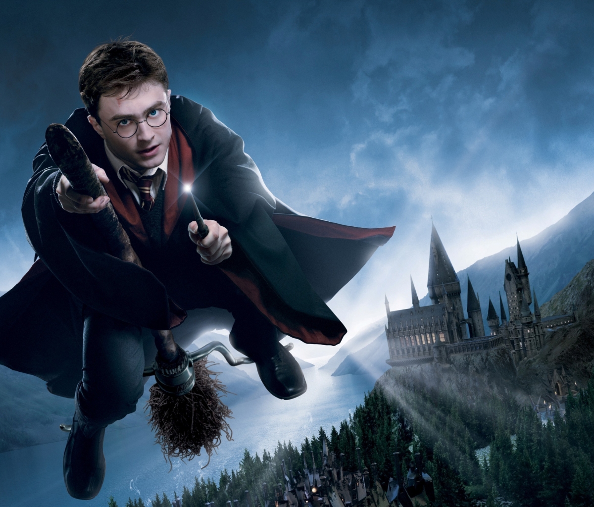 Handy-Wallpaper Harry Potter, Zauberstab, Filme, Hogwarts Schloss kostenlos herunterladen.