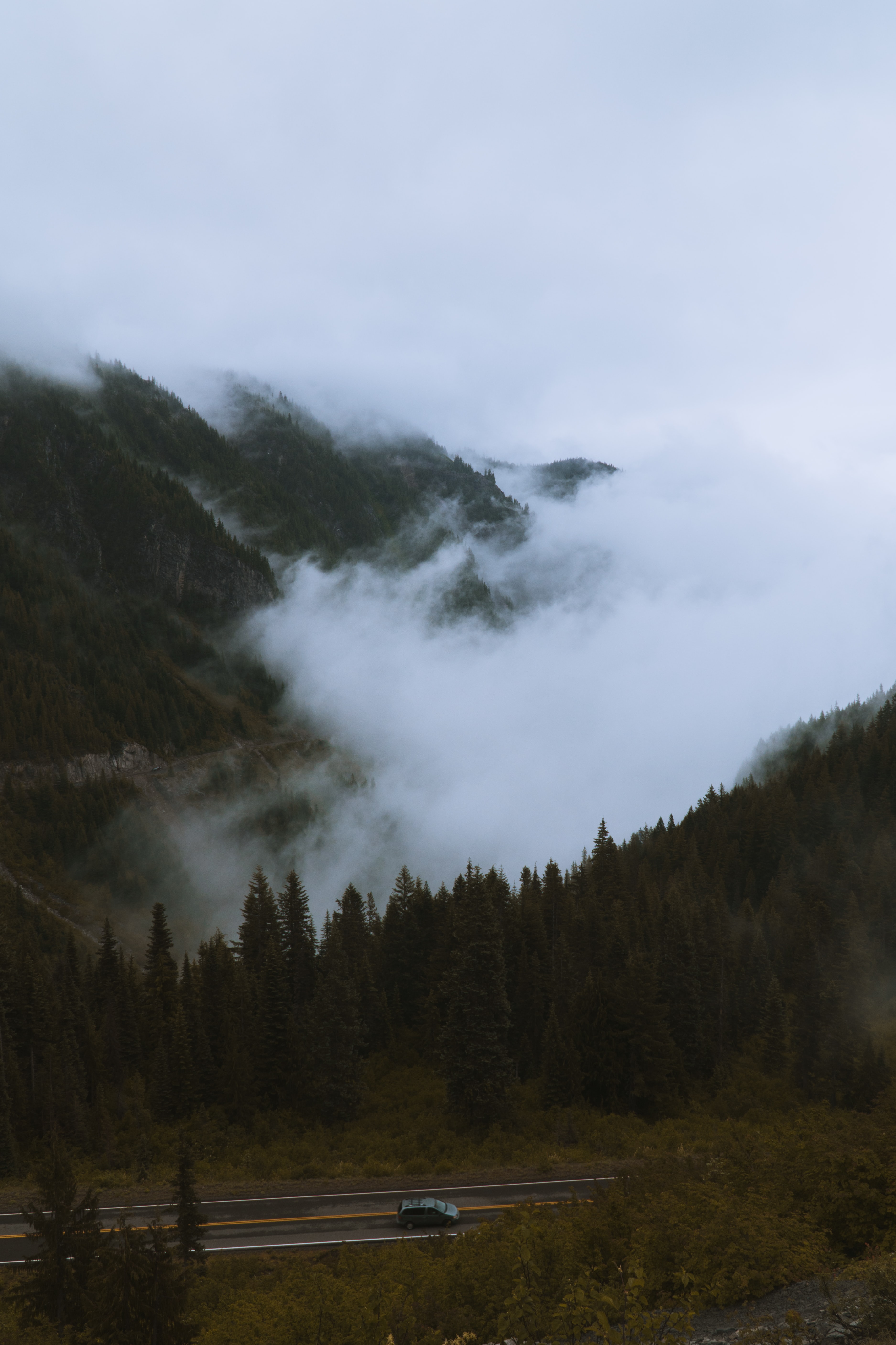 Free download wallpaper Nature, Mountains, Pine, Road, Trees, Fog, Car on your PC desktop