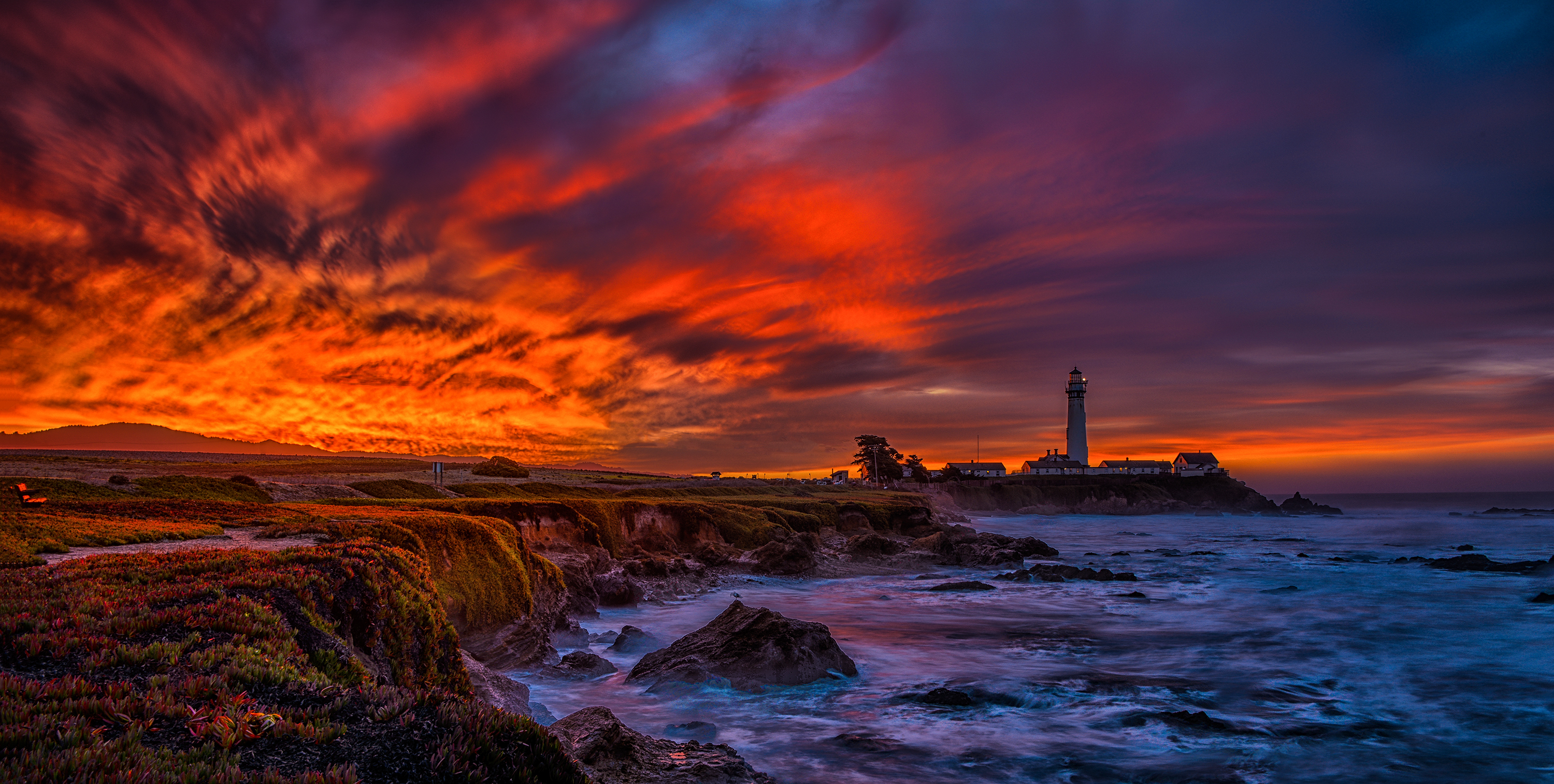 Download mobile wallpaper Sunset, Sky, Ocean, Lighthouse, Man Made for free.