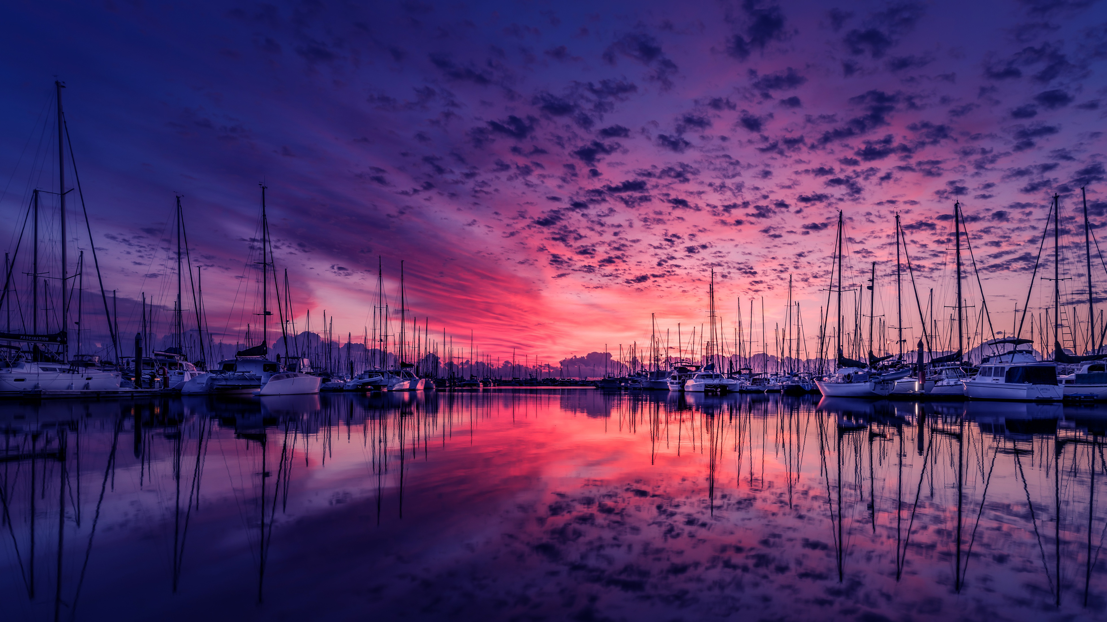 Download mobile wallpaper Water, Sunset, Reflection, Boat, Cloud, Harbor, Man Made for free.