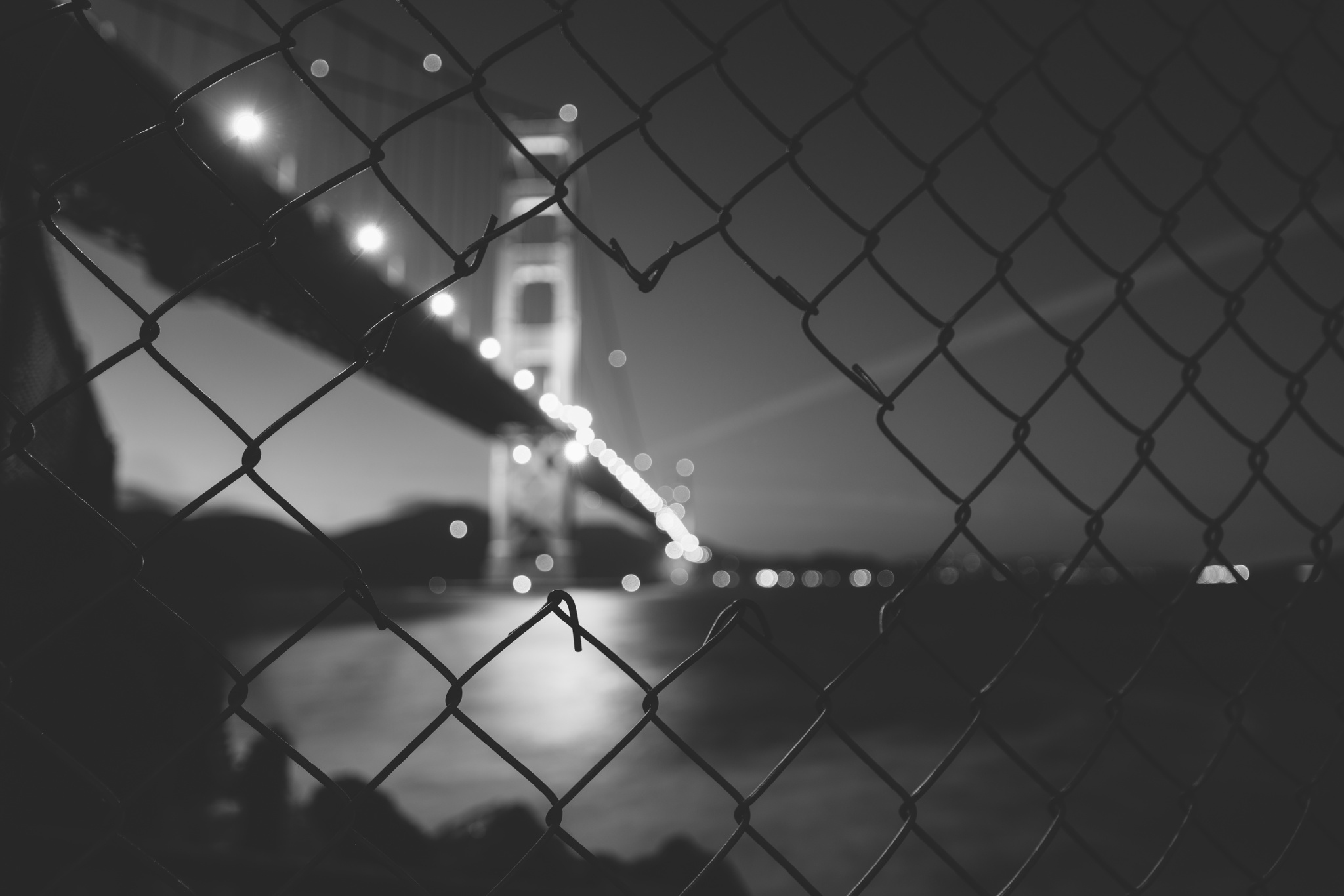 Download mobile wallpaper Golden Gate, California, Black & White, Bridge, Bridges, Fence, Usa, Man Made, Night for free.