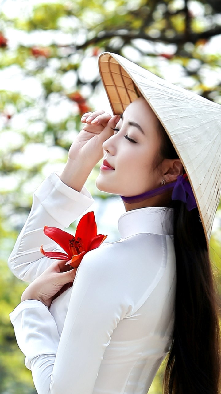 Download mobile wallpaper Flower, Mood, Bokeh, Women, Asian, Vietnamese, Ao Dai, Asian Conical Hat for free.