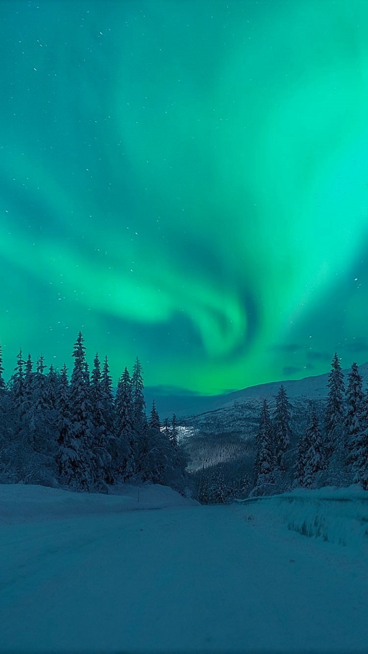 Download mobile wallpaper Winter, Night, Snow, Mountain, Light, Road, Earth, Aurora Borealis for free.