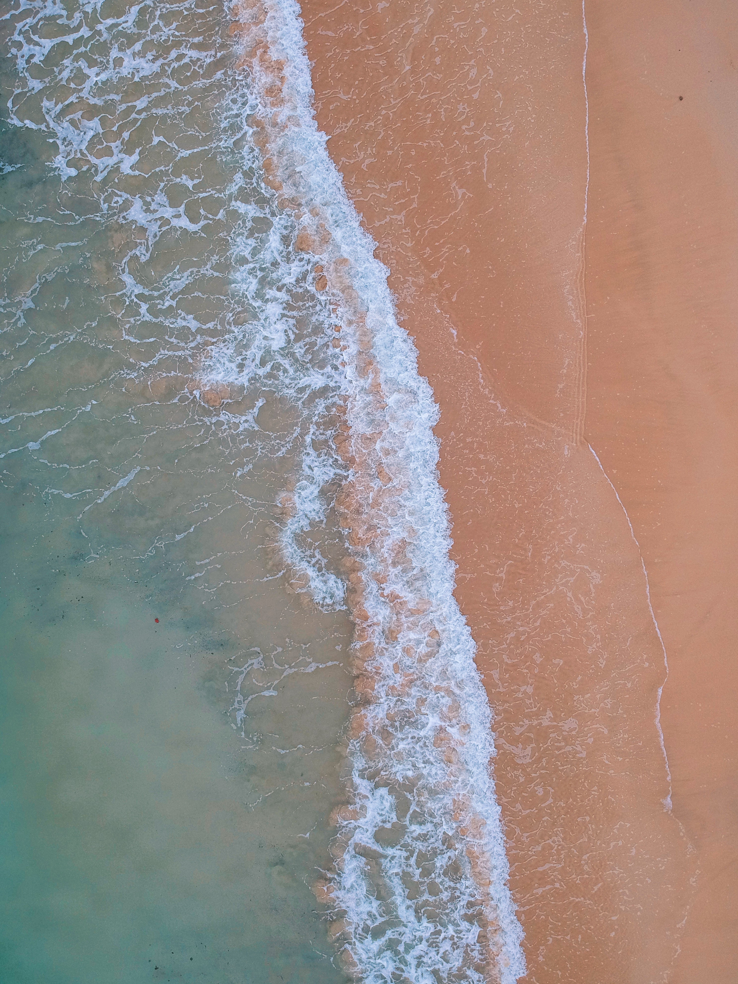 Download mobile wallpaper Ocean, Foam, Water, View From Above, Sand, Nature for free.