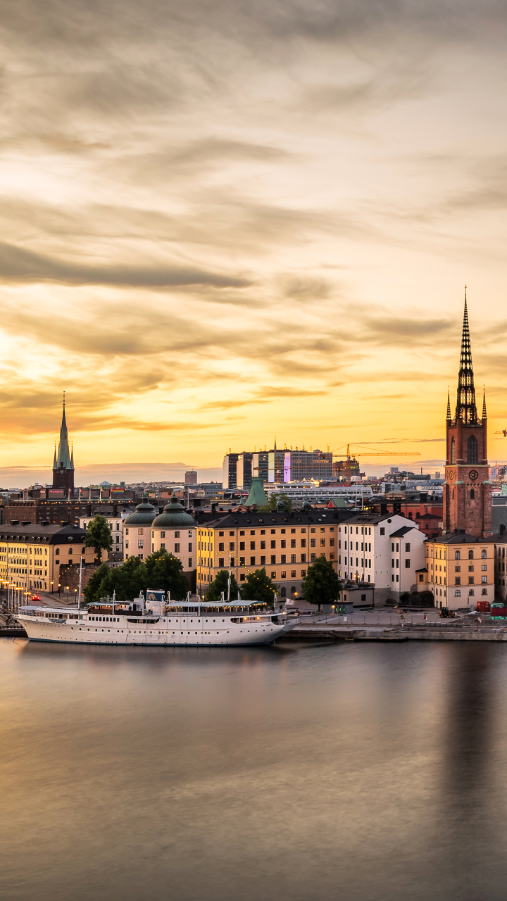 Download mobile wallpaper Cities, Sunset, City, Evening, Stockholm, Sweden, River, Man Made for free.