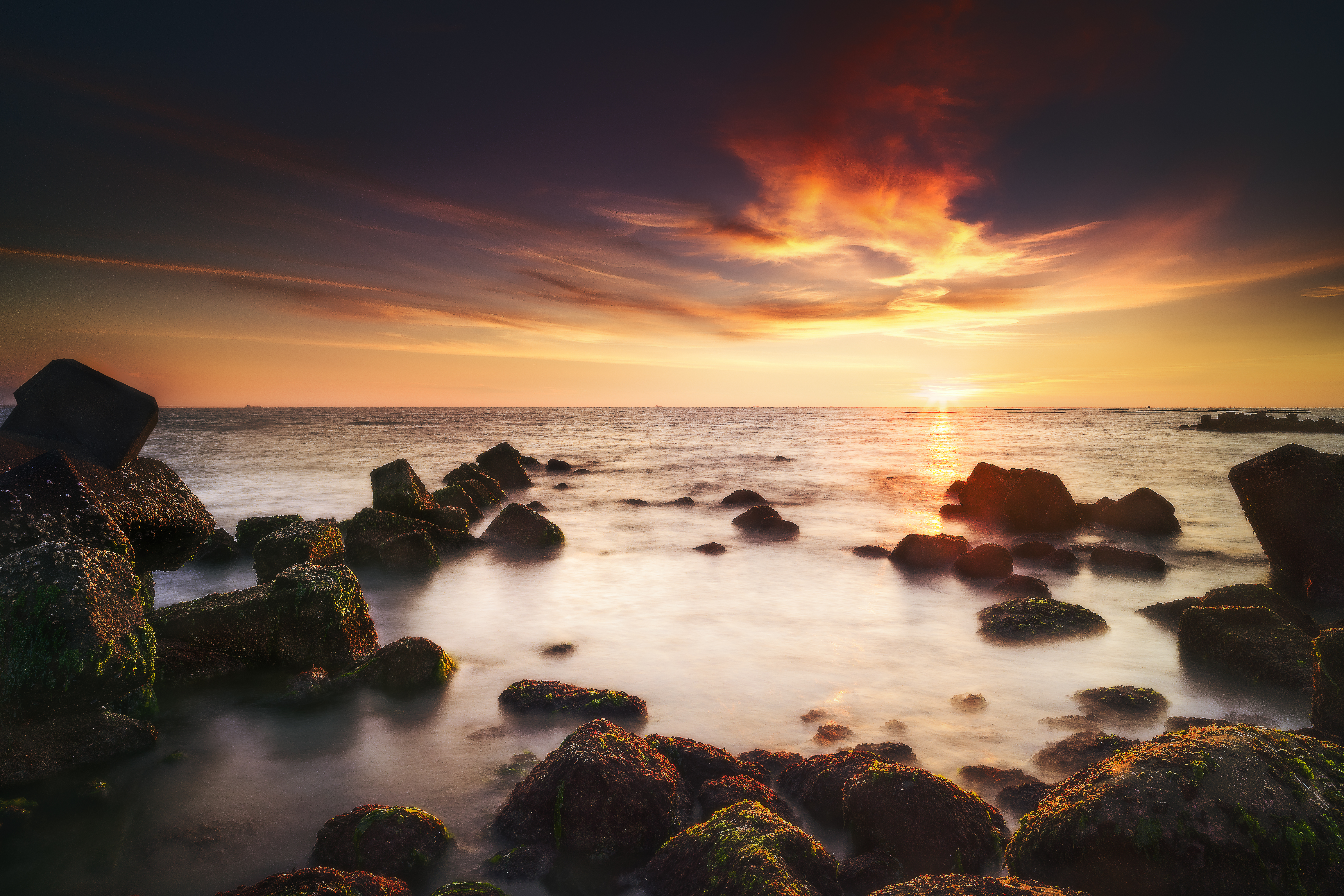 Download mobile wallpaper Stones, Water, Horizon, Sunset, Nature for free.