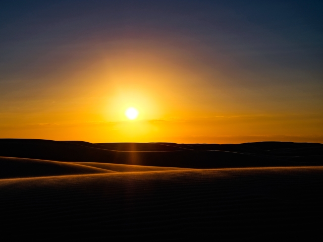 Download mobile wallpaper Nature, Sunset, Sky, Sun, Desert, Earth, Dune for free.