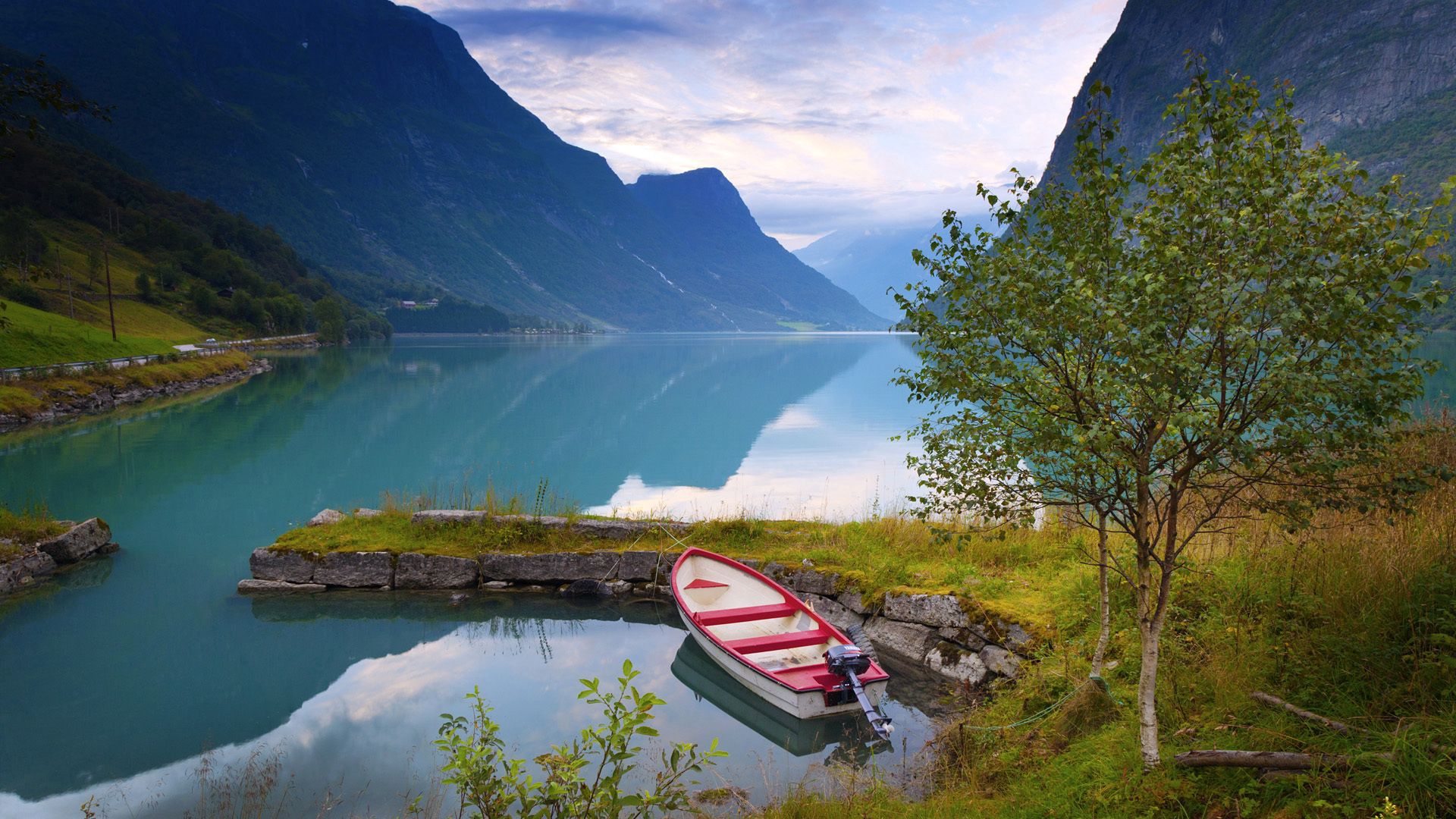 lake, norway, blue water, boat, nature, grass, stones, mountains, shore, bank