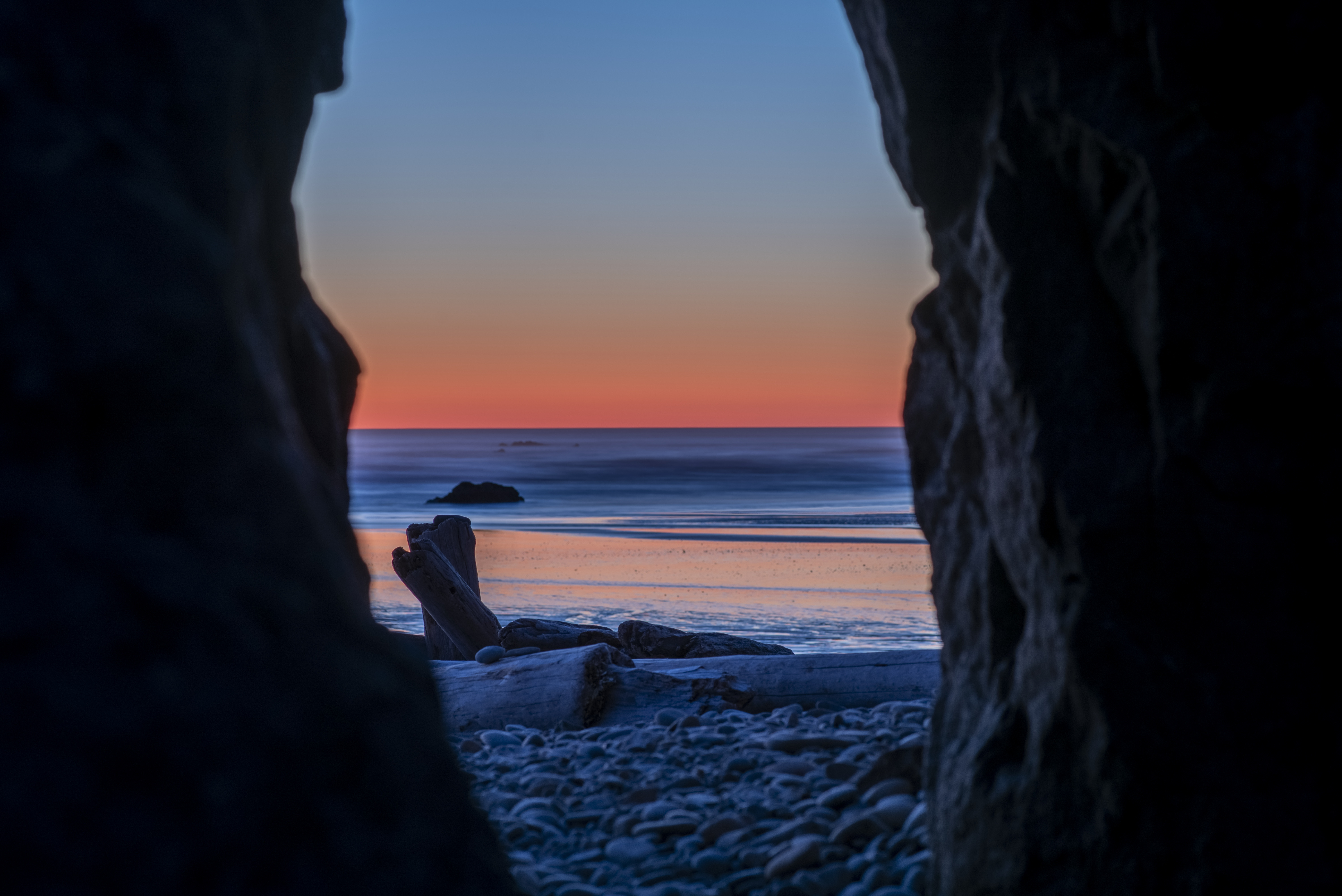 Download mobile wallpaper Horizon, Cave, Sunset, Nature for free.