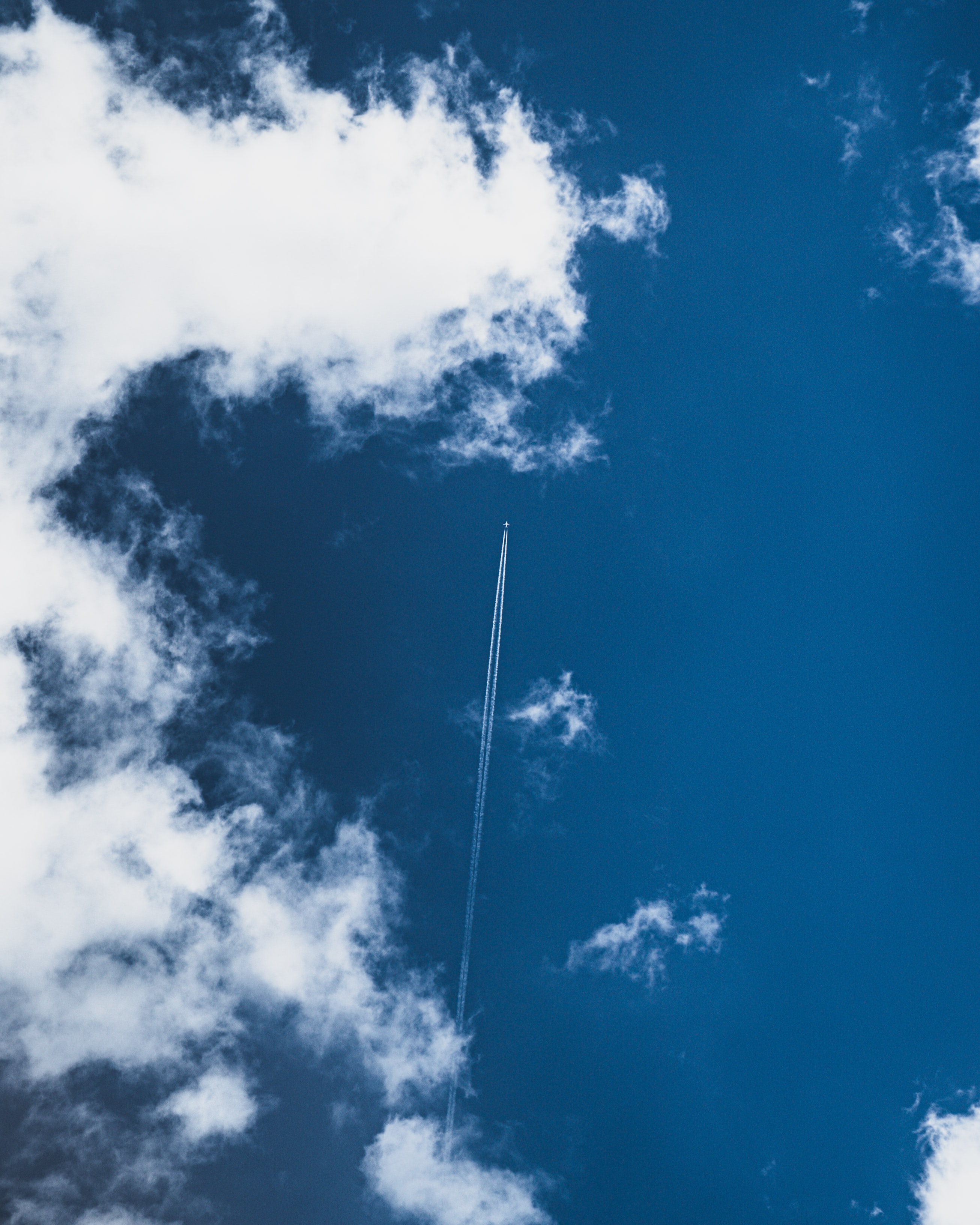 Download mobile wallpaper Clouds, Sky, Miscellaneous, Miscellanea, Smoke, Airplane, Plane for free.