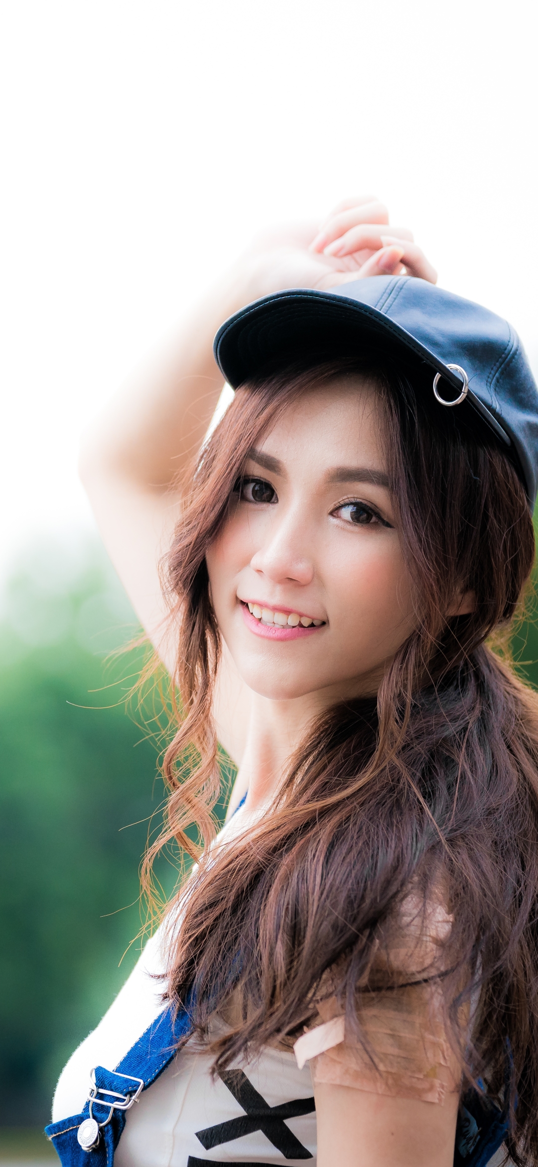 Download mobile wallpaper Smile, Cap, Brunette, Model, Women, Asian for free.