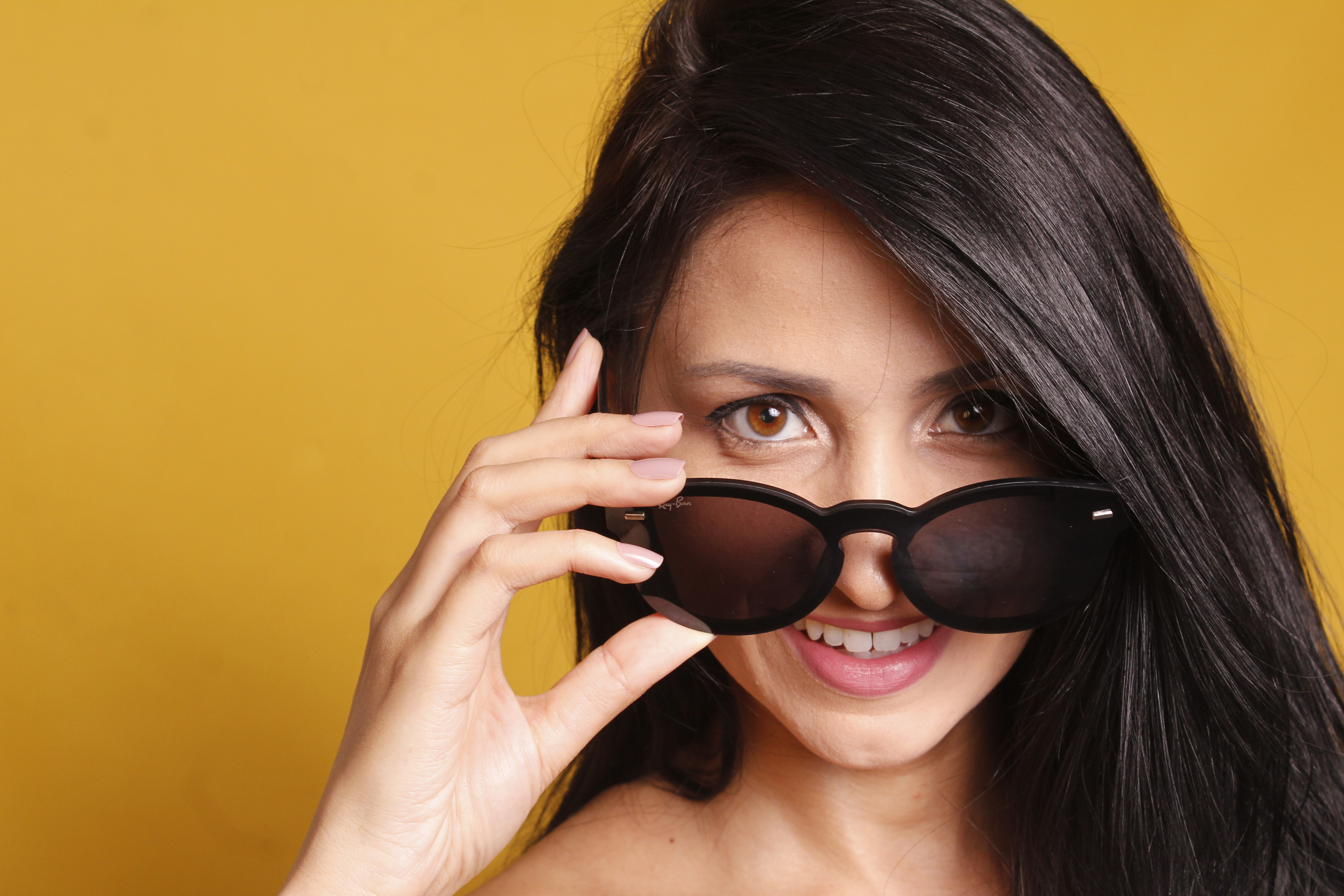 Download mobile wallpaper Smile, Face, Sunglasses, Model, Women, Brown Eyes, Black Hair for free.